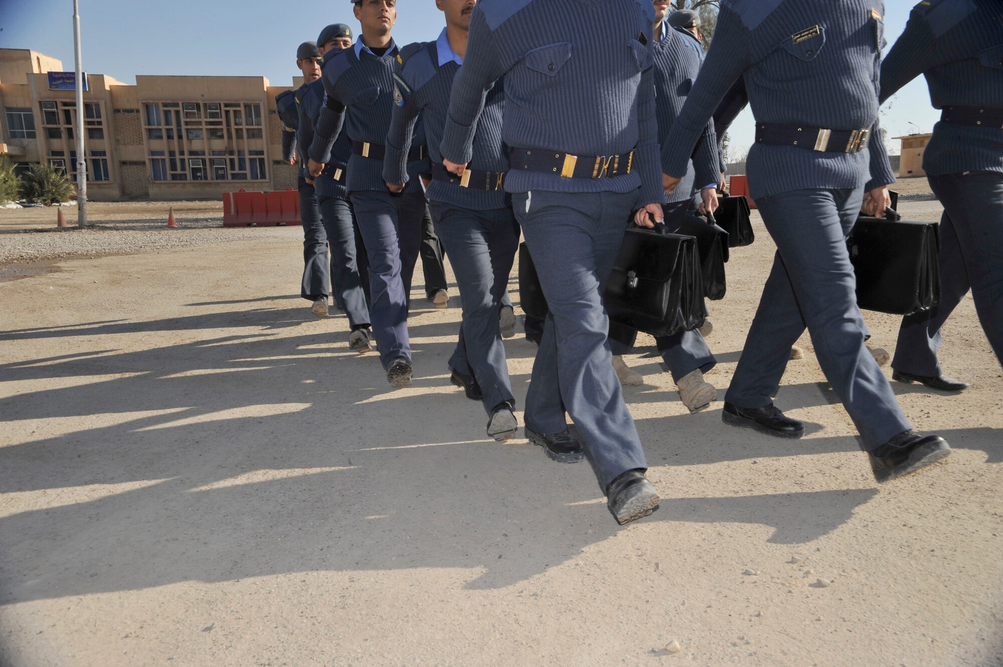 Cadet pilots at the Iraqi Air Force College march to class outside an academic building on the school's campus in Tikrit, Iraq. Students began training in September 2010, as part of the first class at the recently reopened academy. (U.S. Air Force photo/Senior Master Sgt. Larry Schneck) 