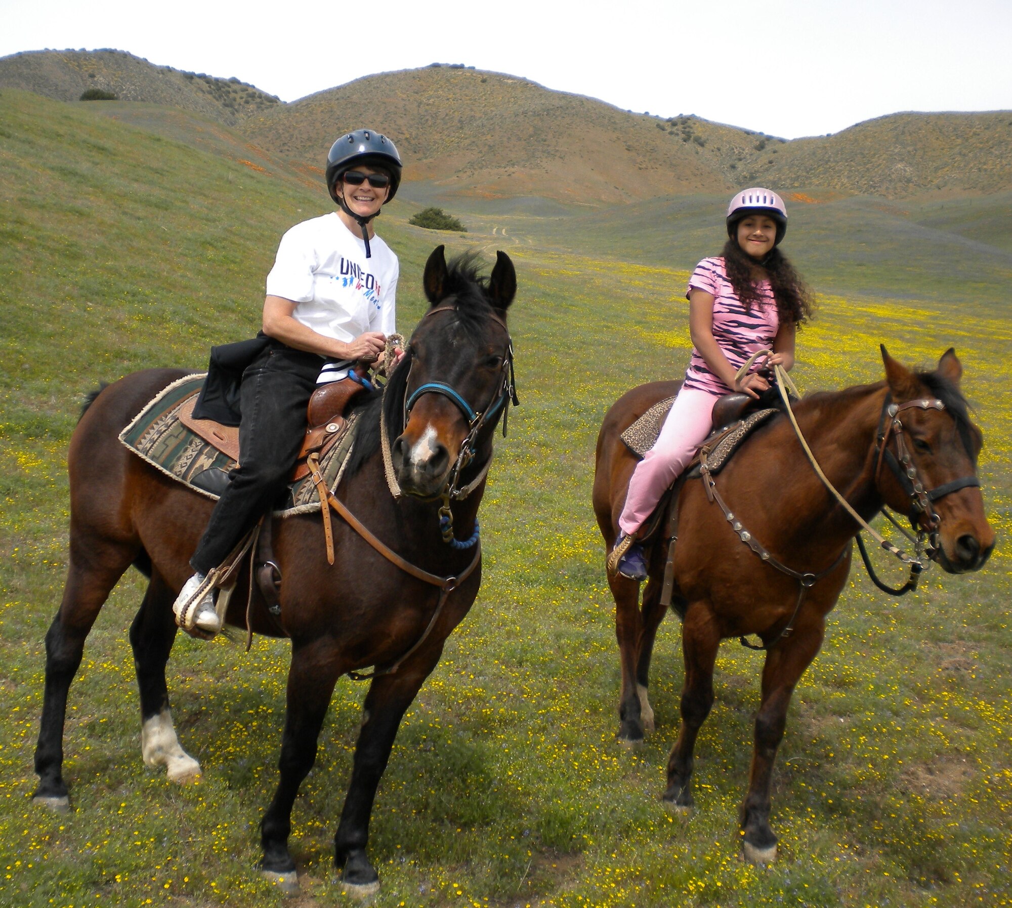 Dr. Ingrid Wysong (left), Air Force Research Laboratory Det. 7, Aerophysics Branch of the Space and Missile Propulsion Division chief scientist, takes her mentee, 12-year-old Khiabet, horseback riding during one of their get togethers. Dr. Wysong volunteers her time with United We Mentor, which has been mentoring Antelope Valley children since 2007. (Courtesy photo)