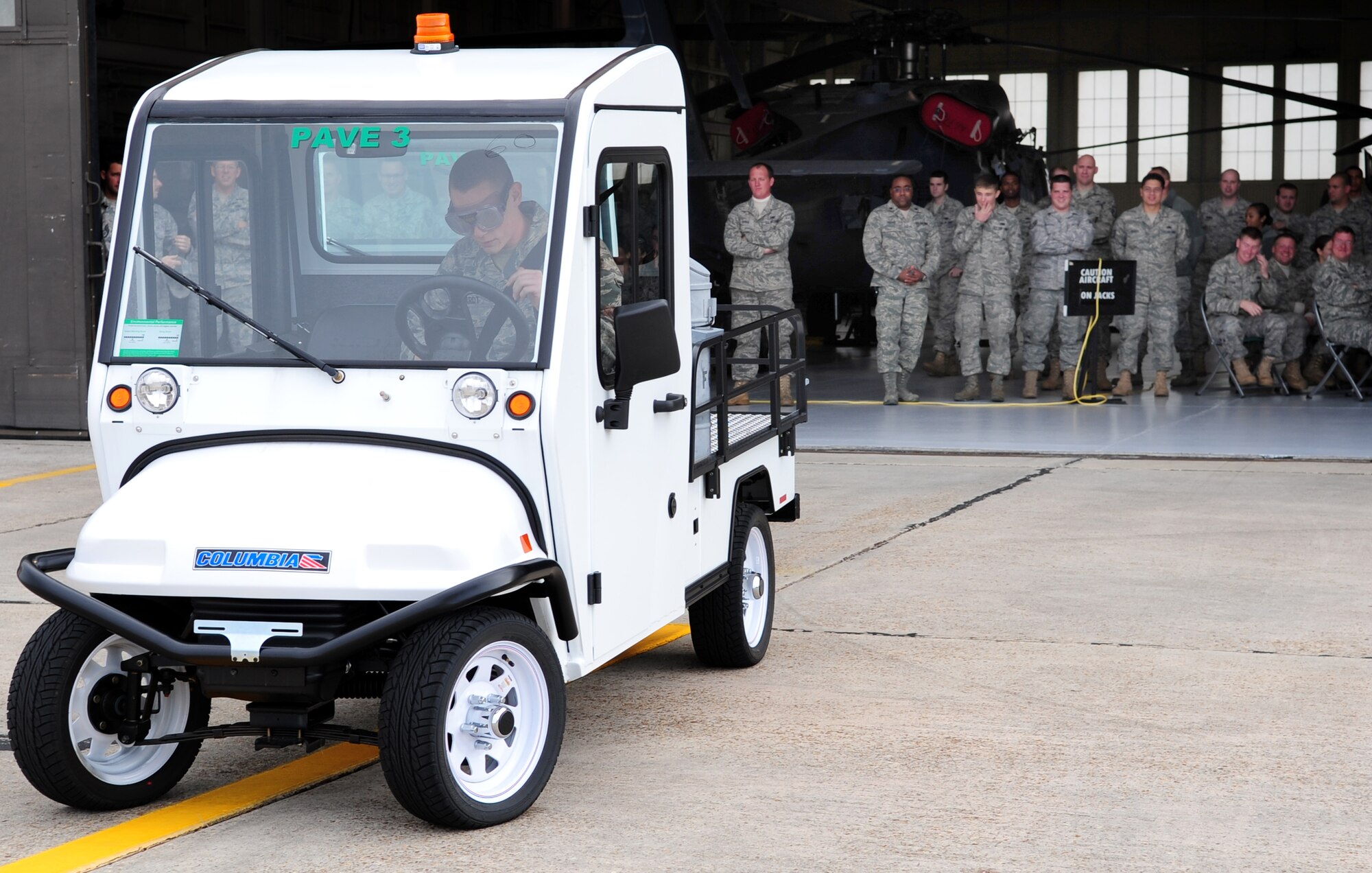 MOODY AIR FORCE BASE, Ga. -- Airman 1st Class Jonathon Gebhardt, 723rd Aircraft Maintenance Squadron, has trouble starting a golf cart while wearing fatal vision goggles. The goggles are used to educate Airmen on the effects and consequences of alcohol use while driving. (U.S. Air Force photo/Senior Airman Stephanie Mancha)(RELEASED)