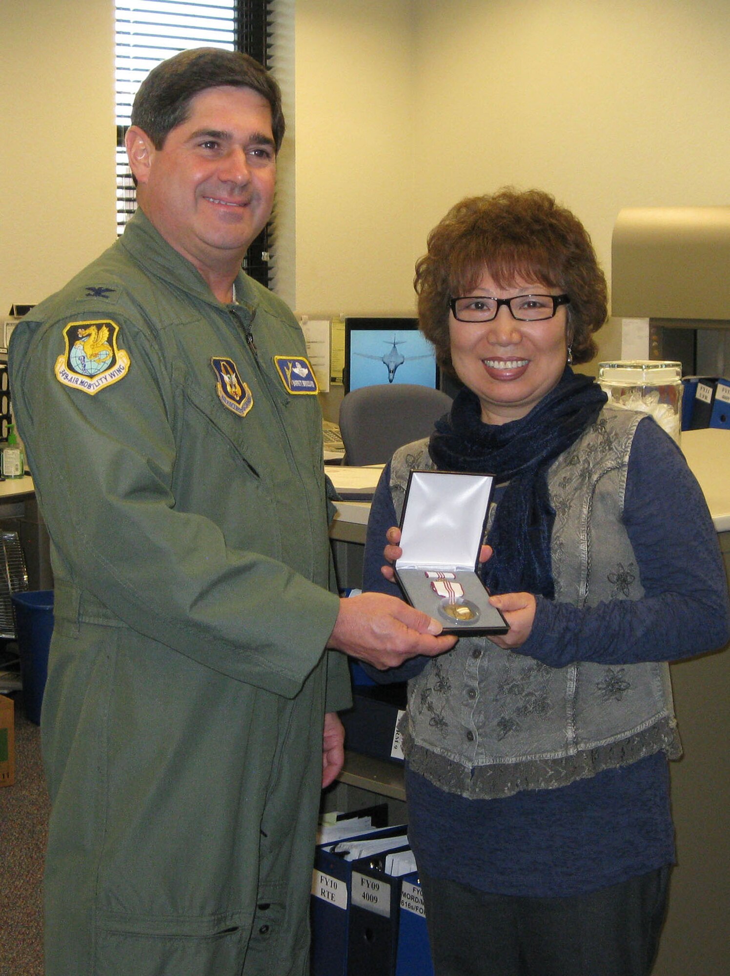 TRAVIS AIR FORCE BASE, Calif. -- The 349th Air Mobility Wing says a fond farewell to Ms. Judy P. Linander, 349th Financial Management, after 25 years of faithful and devoted Federal Civilian Service, Jan. 25. (U.S. Air Force photo/Patti Schwab-Holloway)