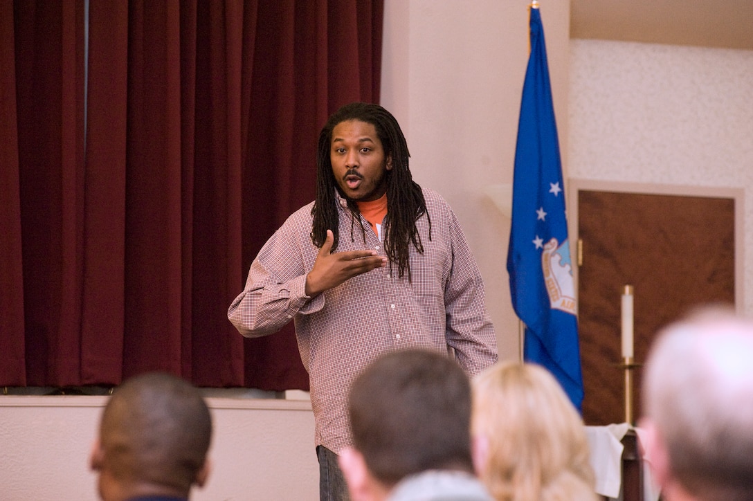 JOINT BASE ANDREWS, Md. – Marquis L. Mix, a spoken word poet, better known as “13 of Nazareth,” delivers a self authored poem entitled “A shot at freedom,” to a Joint Base Andrews audience during a Dr. Martin Luther King Jr., observance at Chapel I *Jan. 21. (U.S. Air Force photo/Bobby Jones)