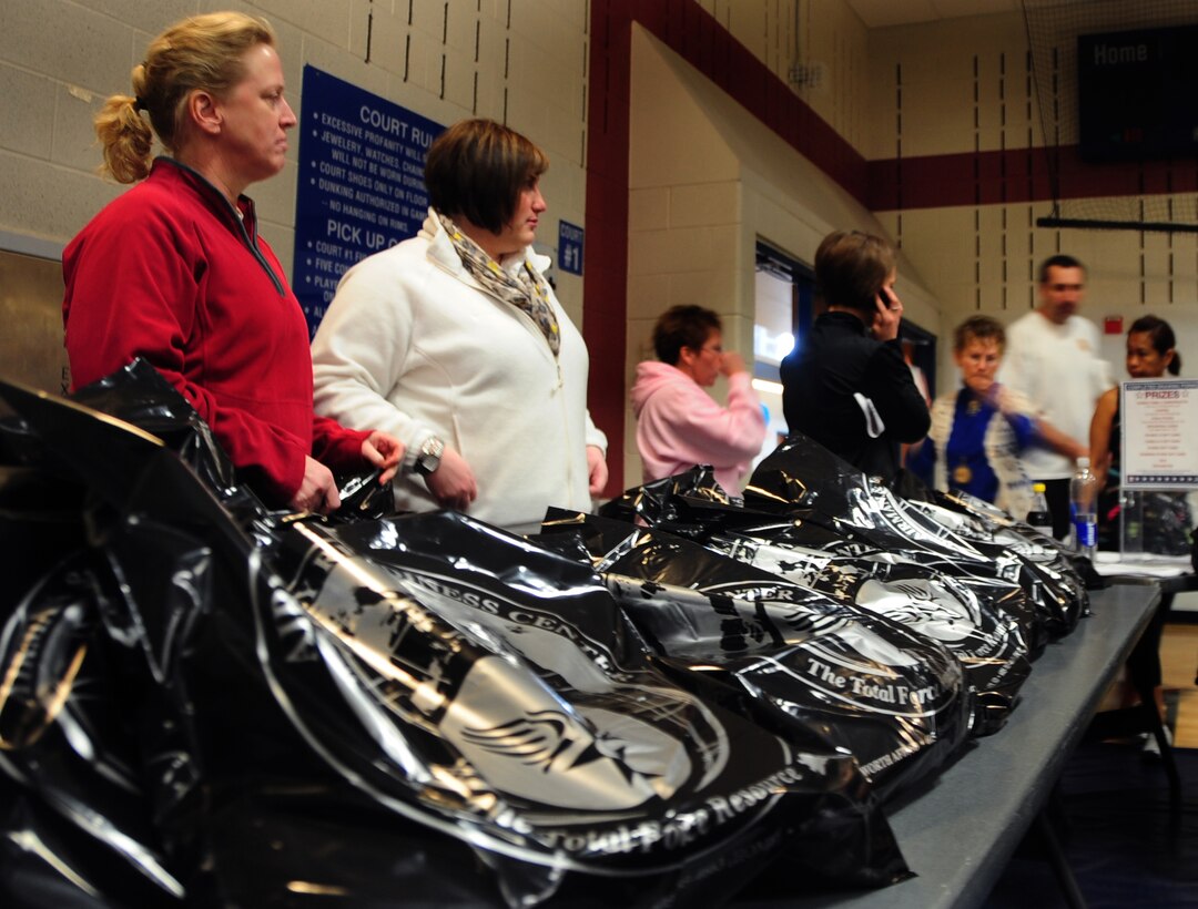 Airmen and their families attend the 2011 Wellness Expo which focused on staying fit and keeping healthy at Ellsworth Air Force Base, S.D., Jan. 22.  Airmen, their families and friends had the opportunity to visit with different vendors from the surrounding area and attend a variety of fitness and health demonstrations. (U.S. Air Force photo/Senior Airman Anthony Sanchelli)
