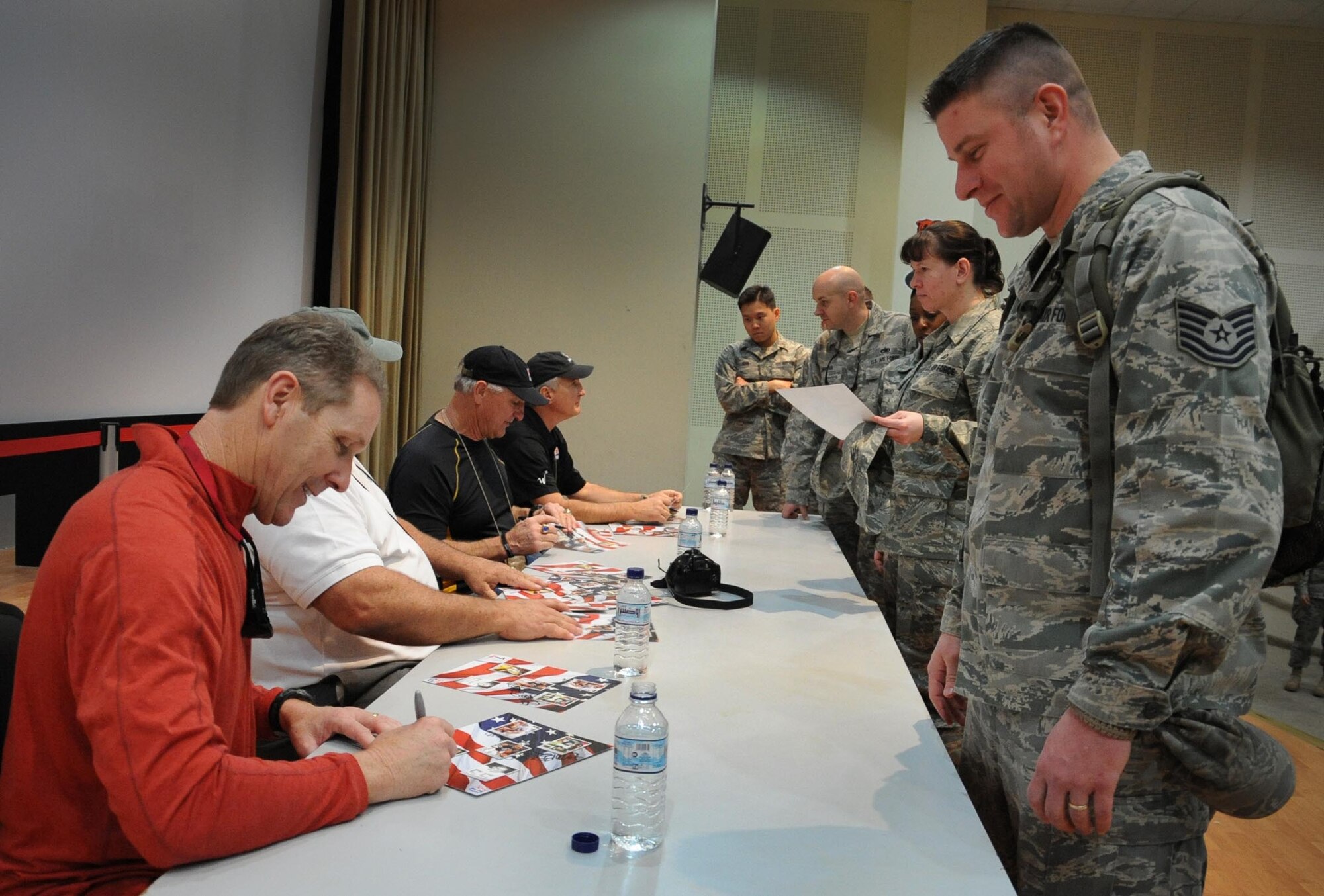 Armed Forces Entertainment presented NFL Alumni legends players Lyle Blackwood, Ed White, Ron Pritchard, Ken Greene and Ray Carolin for a meet and greet with military members deployed here Jan. 25. (U.S. Air Force photo by Senior Airman Cynthia Spalding)