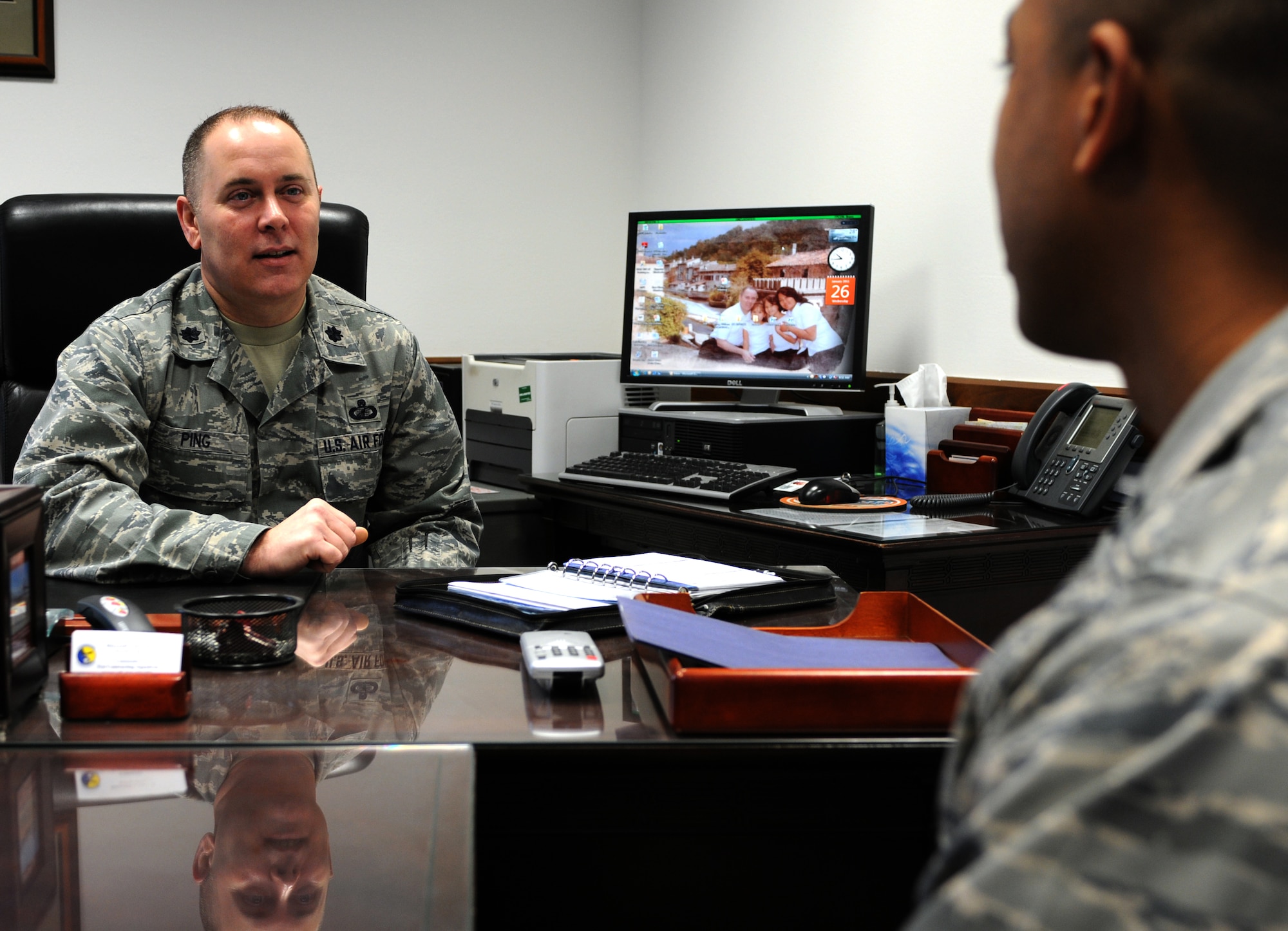 Lt. Col. William Ping, 31st Contracting Squadron commander, talks about contracting issues to Capt. Alfort Belin, III, 31st CONS deputy commander, Jan. 26. Colonel Ping recently received a U.S. Air Forces in Europe Contracting Award for Outstanding Contracting Officer-Field Grade. (U.S. Air Force photo/Staff Sgt. Julius Delos Reyes)
