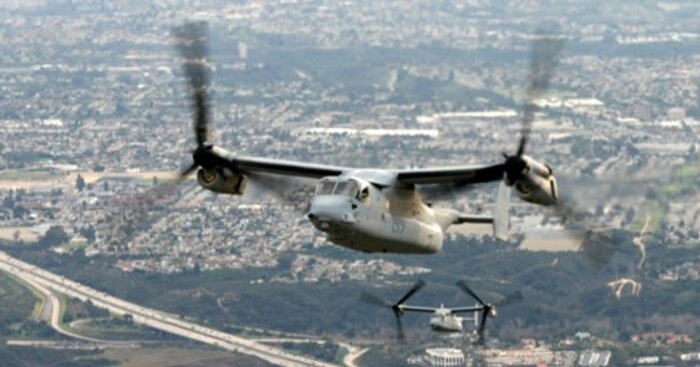 Two MV-22 Osprey from Marine Medium Tiltrotor Squadron 161 (VMM-161) fly over San Diego, Calif., Jan. 11. The Marine Corps Air Station Miramar-based aircraft flew to Yuma, Ariz., to practice landing in formations of three.