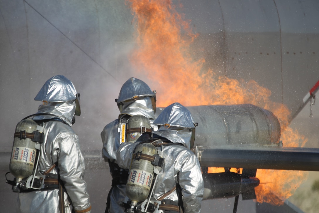 Marines with Marine Wing Support Squadron 374’s aircraft rescue firefighting branch put out blazing flames during their training Jan. 27, 2011. The squadron hosted other non-commissioned officers from around Marine Air Support Group 37, based out of Marine Corps Air Station Miramar, Calif., last week, to show them how the best do it.