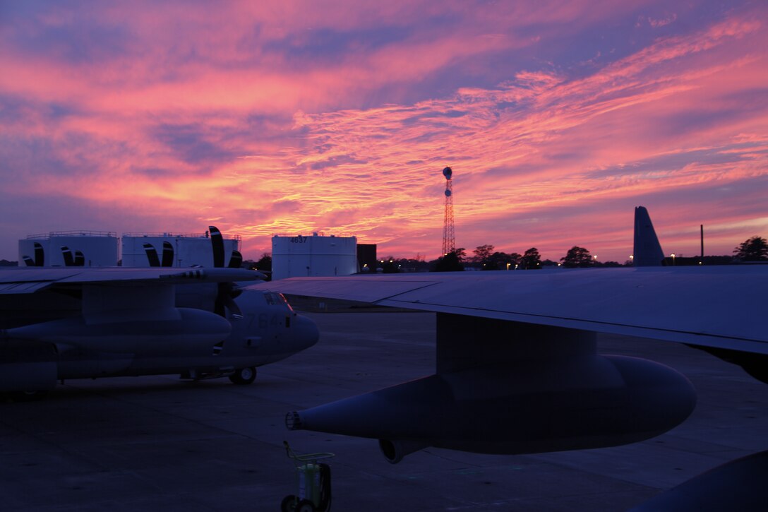 The sun sets on Cherry Point’s flight line outside Marine Aerial Refueler Transport Squadron 252’s hangar Jan. 27. VMGR-252 Marines took off from Cherry Point Jan. 26-27, aboard one of the squadron’s KC-130Js, to refuel F/A-18 Hornets from Marine Corps Air Station Beaufort, S.C., and AV-8B Harriers from Cherry Point as part of a large-force exercise in the Eastern Carolina skies.