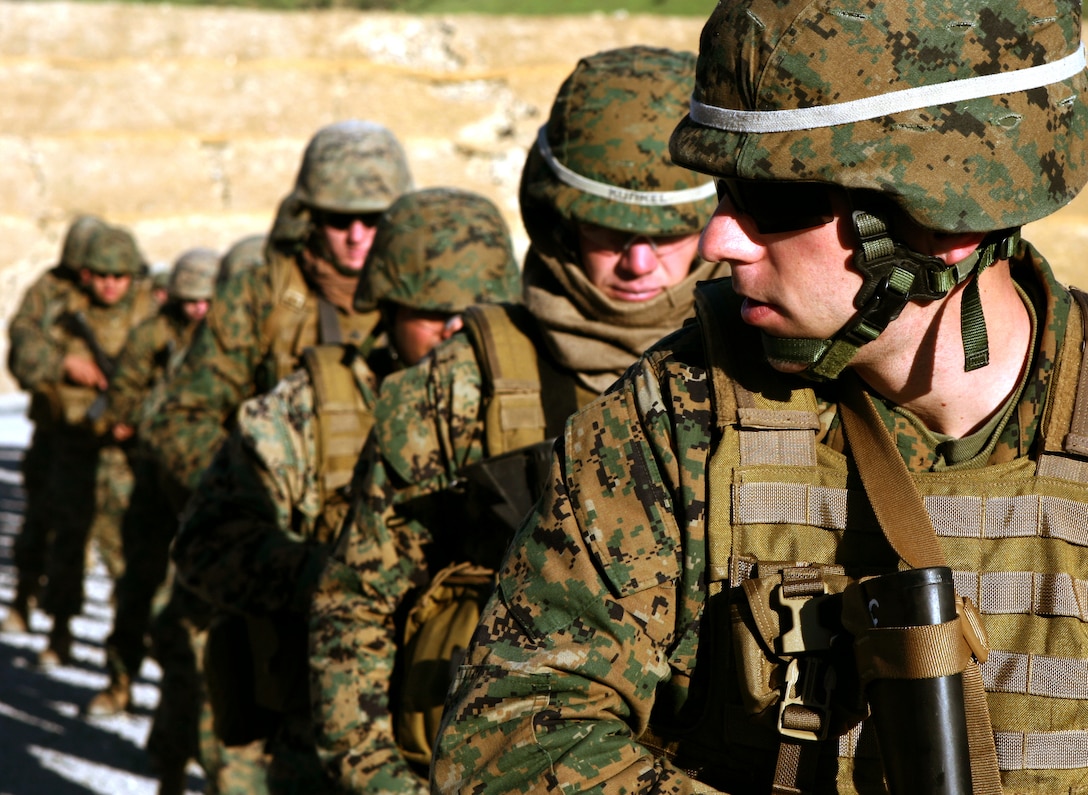 Lined up and ready to fire, Lance Cpl. Matthew A. Irish, a rifleman with the Black Sea Rotational Force-11, Camp Pendleton, Calif., prepares to fire Table 3 drills of the Combat Marksmanship Program. The Special Purpose Marine Air-Ground Task Force is slated to deploy in  a few months to the Black Sea region to engage, advise and build military capacities of foreign host nations.::r::::n::