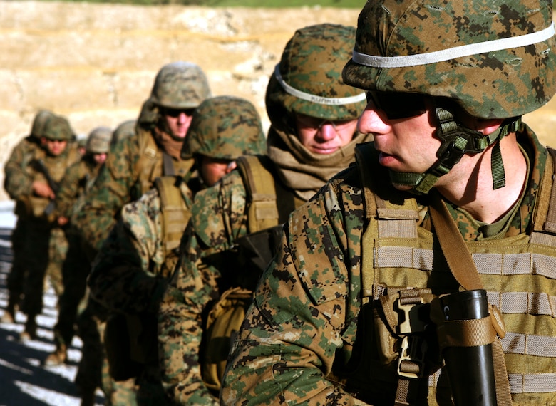 Lined up and ready to fire, Lance Cpl. Matthew A. Irish, a rifleman with the Black Sea Rotational Force-11, Camp Pendleton, Calif., prepares to fire Table 3 drills of the Combat Marksmanship Program. The Special Purpose Marine Air-Ground Task Force is slated to deploy in  a few months to the Black Sea region to engage, advise and build military capacities of foreign host nations.::r::::n::