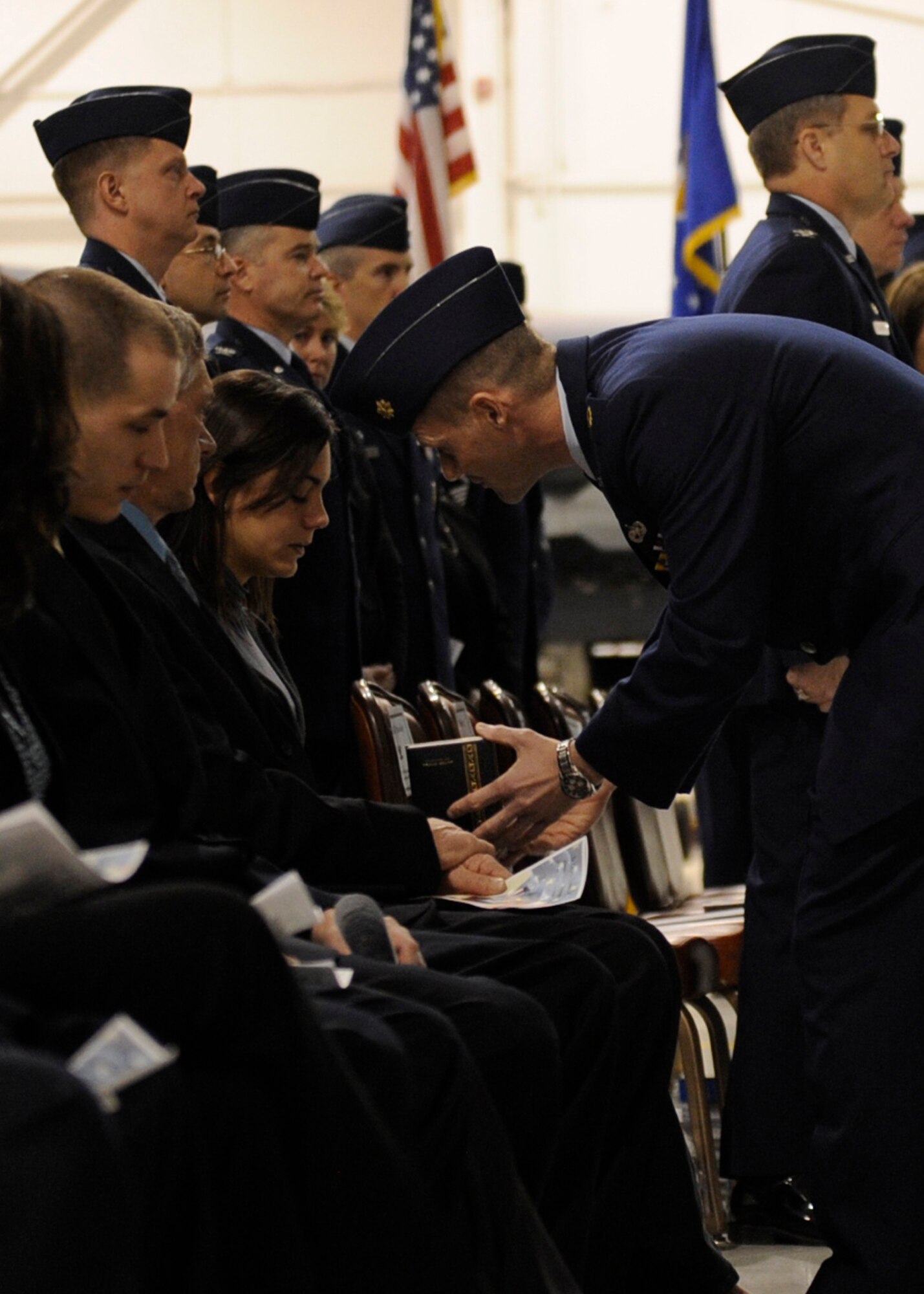 MOUNTAIN HOME AIR FORCE BASE, Idaho -- Maj. Charles Dunway, 366th Equipment
Maintenance Squadron commander, presents Meghan Burroughs with the
meritorious service medal during a memorial service held for her late
husband, Airman Jamie Burroughs. Airman Burroughs' service was held Jan. 27
in Hangar 1331, where Gunfighters gathered to revel in his memory. Airman
Burroughs was a member of the 366th EMS. (U.S. Air Force photo by Senior
Airman Angelina Drake)
