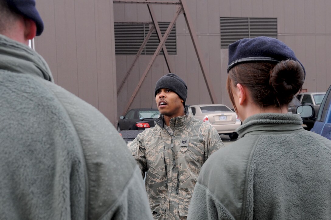 LANGLEY AIR FORCE BASE, Va. -- Staff Sgt. Marquin King, 633d Security Forces Squadron active shooter instructor, debriefs personnel after practicing a bounding scenario, during active shooter training at the SFS building Jan. 26. Security Forces consolidated a year-long on-the-job training into a month-long battery of required tasks to minimize the impact on day-to-day operations. (U.S. Air Force photo/Staff Sgt. Ashley Hawkins)(RELEASED)