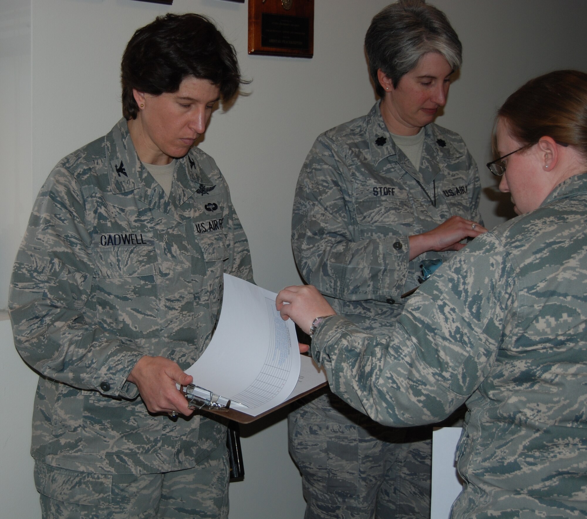 LAUGHLIN AIR FORCE BASE, Texas – Colonel Angela Cadwell, 47th Mission Support Group commander, and Lt. Col. Karen Stoff, 47th MSG deputy commander, take time to judge a chili contest at the 47th Civil Engineering Squadron Jan. 27. The 47th Flying Training leadership actively participates in events boosting morale around base on a daily basis. (U.S. Air Force photo by 2nd Lt. Ashley Wolfe)