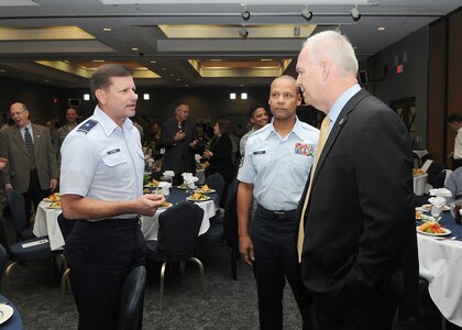 Brig. Gen. Leonard Patrick, 502nd Air Base Wing commander, talks with George DeCoux, 502nd ABW directory of staff, and Chief Master Sgt. James Glover, 802nd Mission Support Group superintendent, prior to the 502nd ABW Annual and 4th Quarter Awards Ceremony at the Kendrick Enlisted Club on Randolph Air Force Base, Texas, Jan. 26. (U.S. Air Force photo/David Terry)