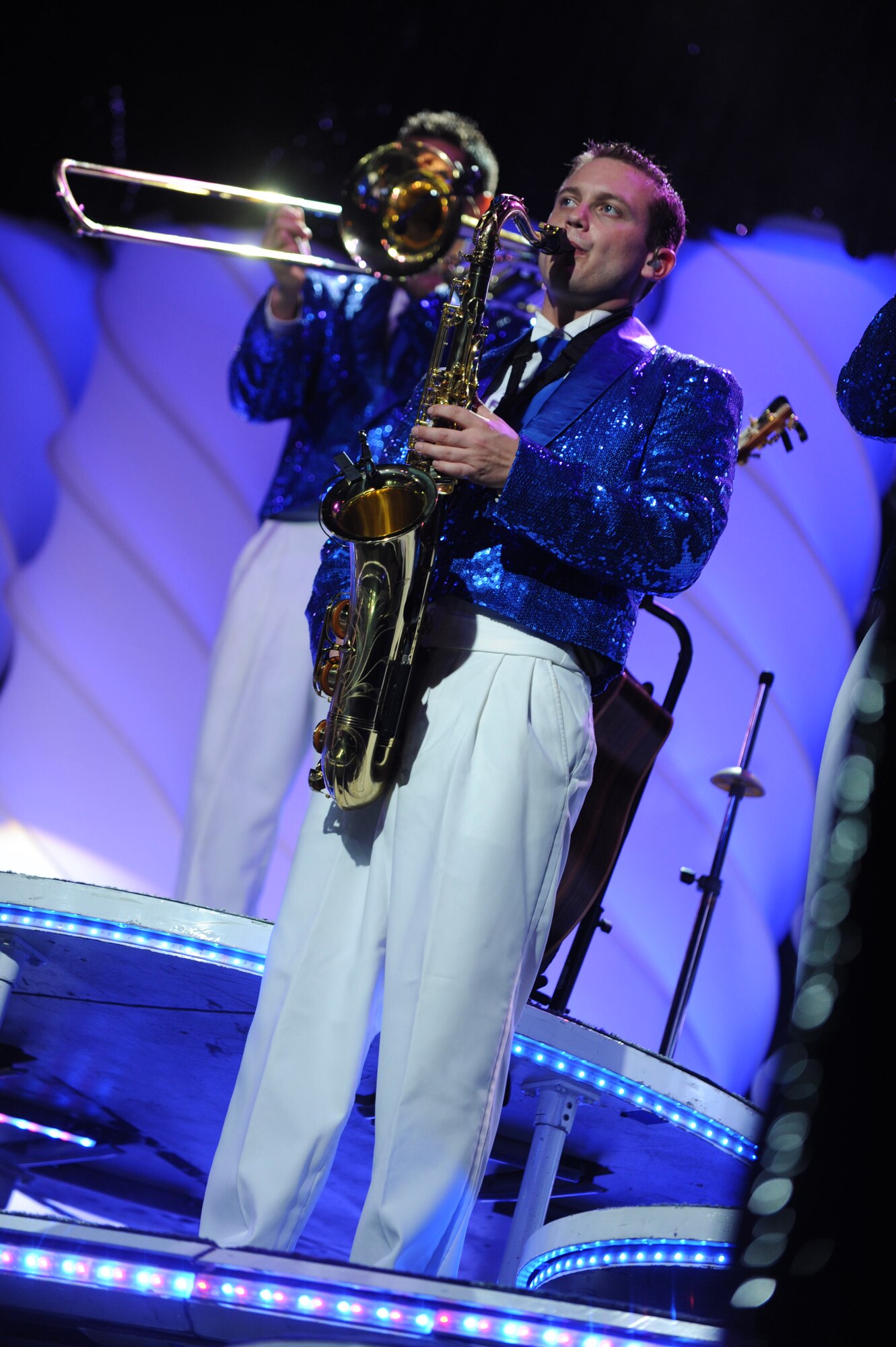 The Tops in Blue band performs during a show at Freedom Tower on Joint Base Pearl Harbor-Hickam, Hawaii, Jan 26. The band portion of Tops in Blue consists of 10 members who have been selected from hundreds of Air Force applicants. In the past decade, Tops in Blue was among the first entertainment groups to travel into Afghanistan, Uzebikstan, Pakistan, Qatar and Kyrgyzstan to raise the morale of the troops. (U.S. Air Force Photo/Airman 1st Class Lauren Main)