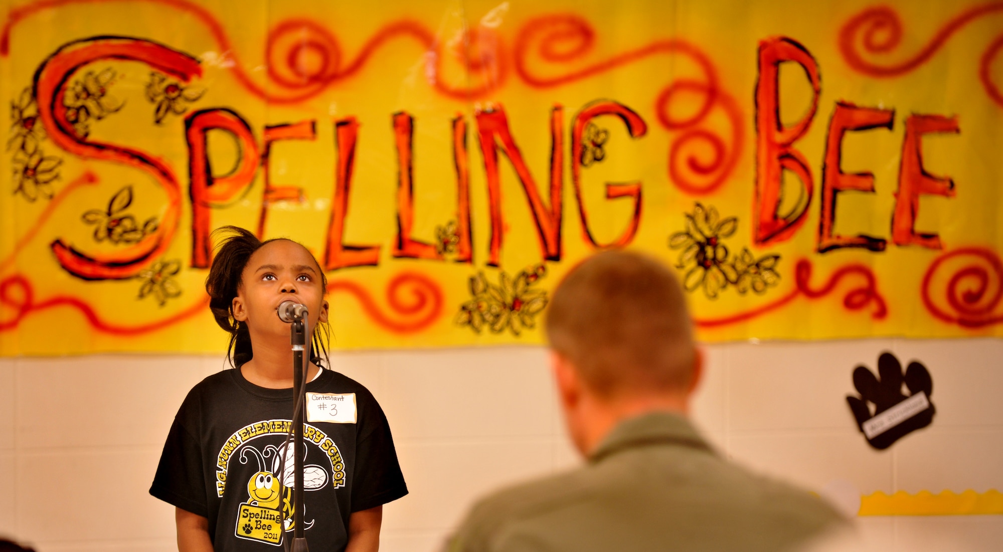 VALDOSTA, Ga.--  Raven Ford, fourth-grade student from William Gaines Nunn Elementary School , focuses on the word she was given to spell during the King and Queen Spelling Bee Jan. 21. Col. Gary Henderson, 23rd Wing commander, was an honorary guest for the judge portion of the spelling bee. (U.S. Air Force photo/Airman 1st Class Joshua Green)(RELEASED)
