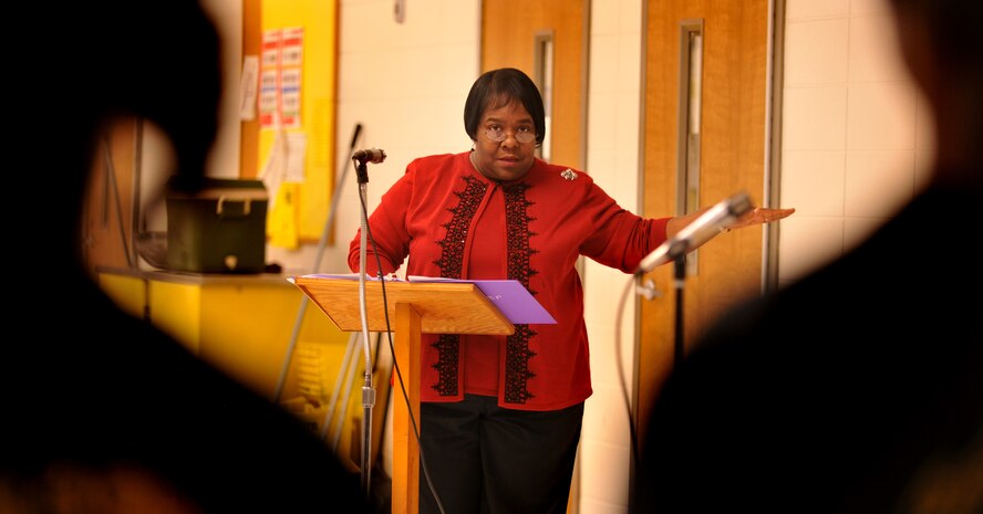 VALDOSTA, Ga.-- Dr. Beverley Richardson-Blake, pronouncer for the King and Queen Spelling Bee at William Gaines Nunn Elementary School, announces the rules and instructions to participating students Jan. 21. The spelling bee was held at William Gaines Nunn Elementary School. (U.S. Air Force photo/Airman 1st Class Joshua Green)(RELEASED)
