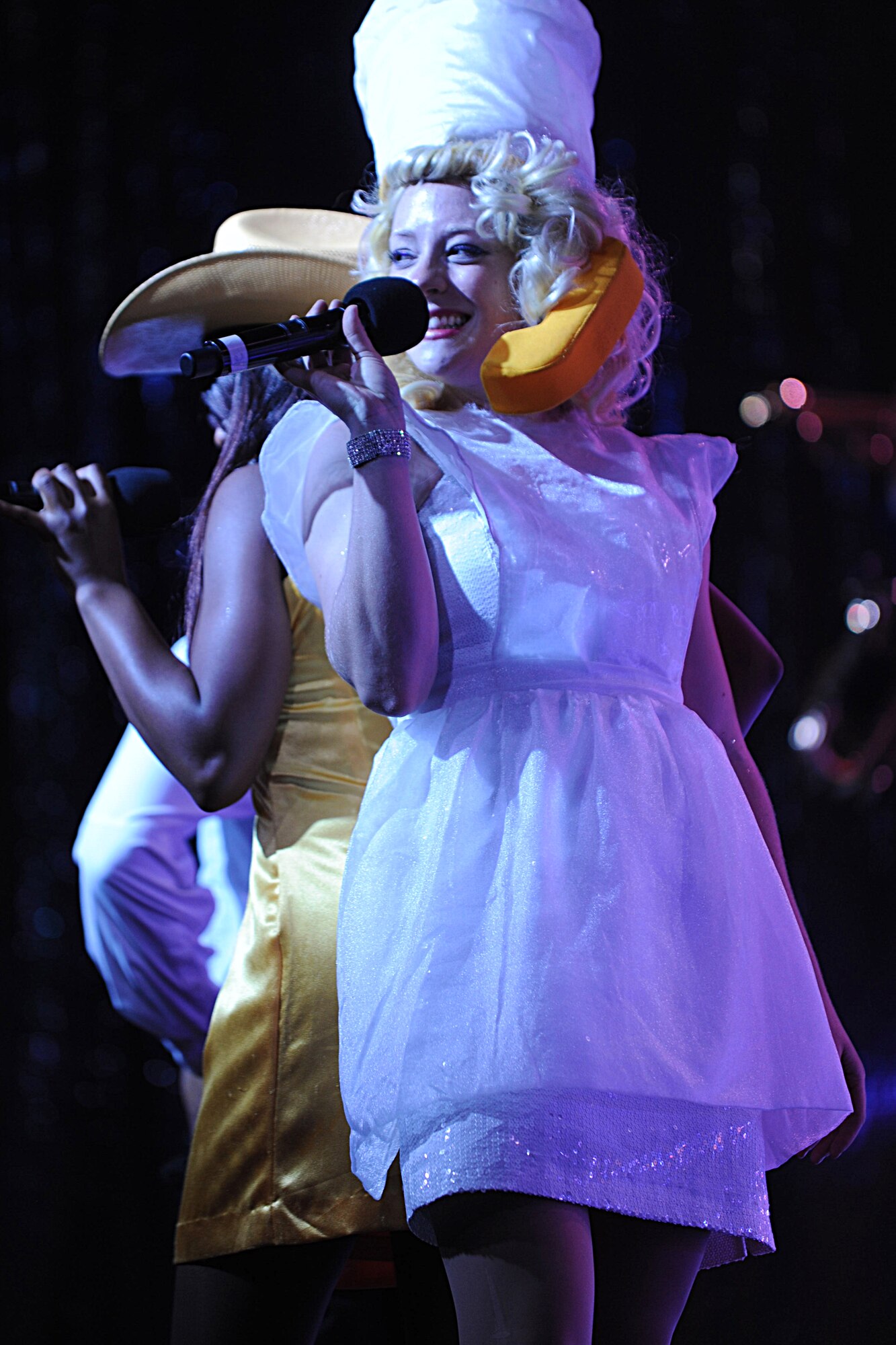 Entertainers from Tops in Blue perform Lady Gaga and Beyonce impersonations during the Tops in Blue show at Freedom Tower on Joint Base Pearl Harbor-Hickam, Hawaii, Jan 26. Major Al Reilly created the Air Force Worldwide Talent Contest in 1953 to recognize talented Airmen in various categories ranging from comedy, drama, vocals and musical instruments. During the first year, Tops in Blue performed 230 shows in 235 days. The same breakneck pace continues today. (U.S. Air Force Photo/Airman 1st Class Lauren Main)