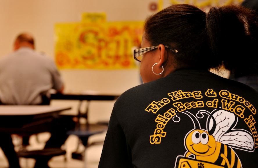 VALDOSTA, Ga.-- A student wears a T-shirt that says “The King and Queen Speller Bees of W. G. Nunn Elementary school”  Jan. 21. This is the 2nd annual spelling bee for the school who invited guests from around the community, including Col. Gary Henderson, 23rd Wing commander, to participate and help judge. (U.S. Air Force photo/Airman 1st Class Joshua Green)(RELEASED)
