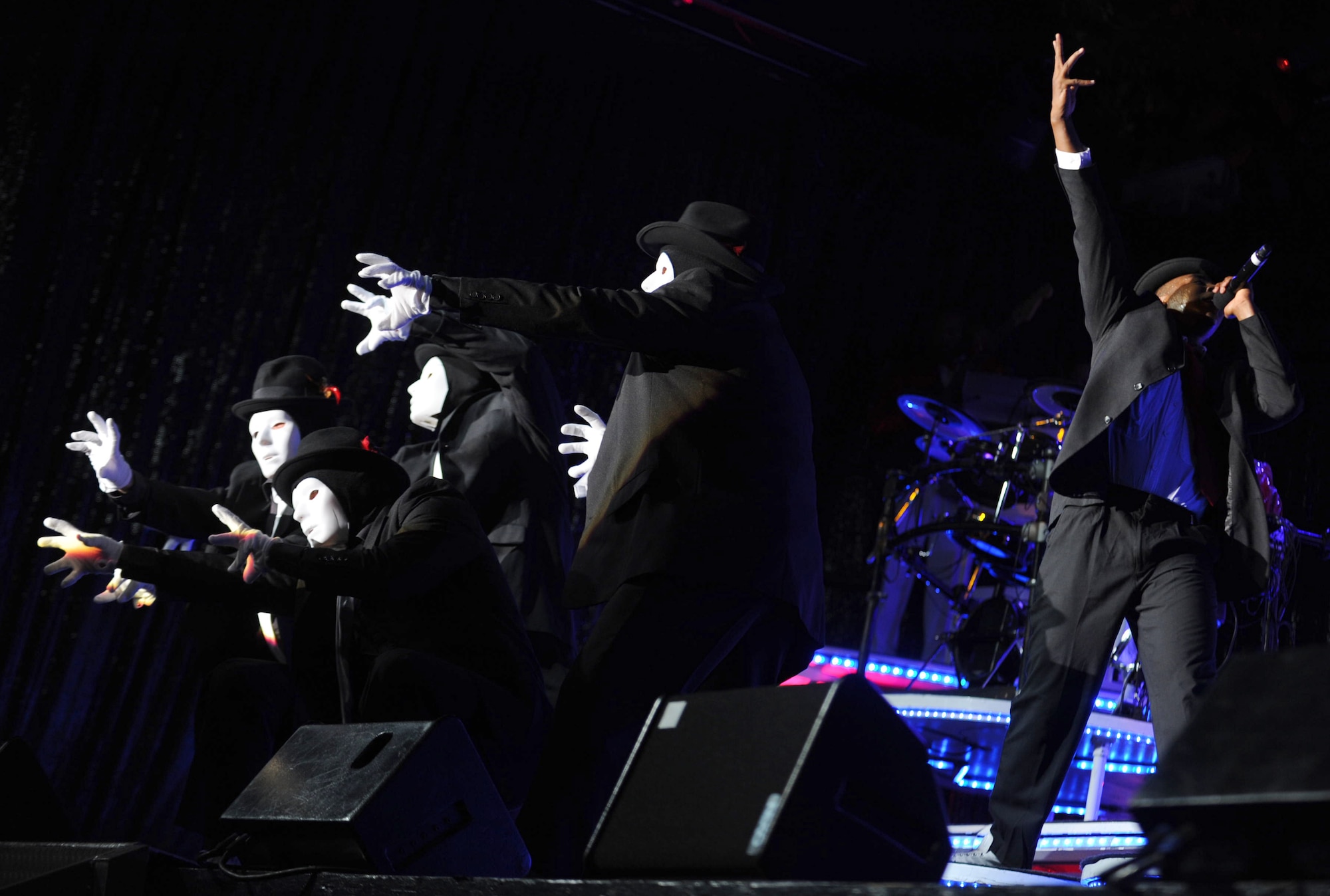 Entertainers from Tops in Blue perform a Michael Jackson act at Freedom Tower on Joint Base Pearl Harbor-Hickam, Hawaii, Jan. 26. Before each performance, the Airmen of Tops in Blue unload and set up more than 80,000 pounds of equipment and use more than two miles of electrical cable. (U.S. Air Force Photo/Airman 1st Class Lauren Main)
