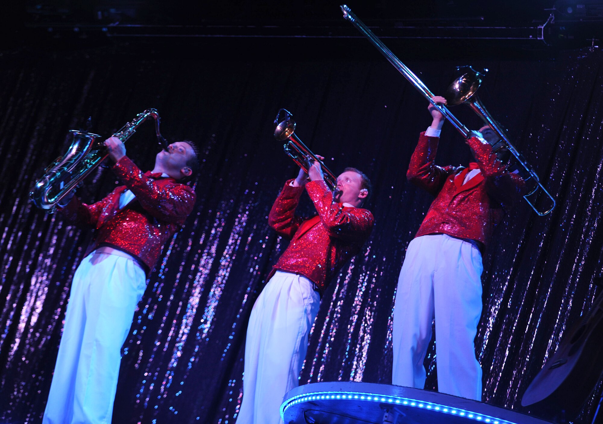 The Tops in Blue band performs during a show at Freedom Tower on Joint Base Pearl Harbor-Hickam, Hawaii, Jan 26. The band portion of Tops in Blue consists of 10 members who have been selected from hundreds of Air Force applicants. In the past decade, Tops in Blue was among the first entertainment groups to travel into Afghanistan, Uzebikstan, Pakistan, Qatar and Kyrgyzstan to raise the morale of the troops. (U.S. Air Force Photo/Airman 1st Class Lauren Main)