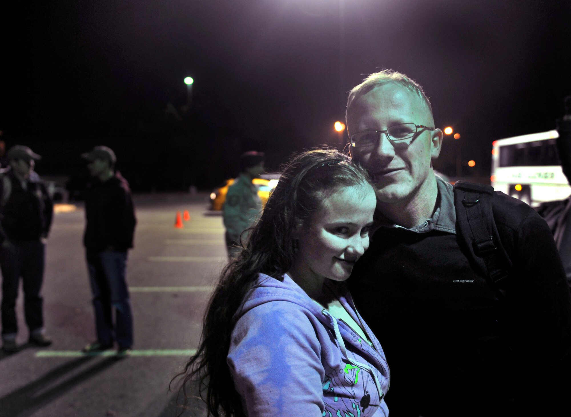 Husband and wife, Airman 1st Class Brigitte Brantley-Sisk and Staff Sgt. Clifford Sisk are finally reunited Jan. 12, 2011, after five months of separation due to a deployment. Airman Brantley-Sisk is a 23rd Wing Public Affairs journalist and Sergeant Sisk is from the 38th Rescue Squadron. (U.S. Air Force photo/Airman 1st Class Joshua Green)