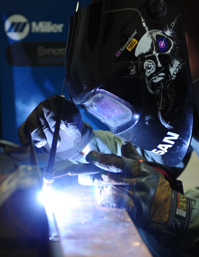 Airman 1st Class Webb Travis, 28th Maintenance Squadron aircraft metals technology technician, performs tungsten inert gas welding while repairing a bomb loader panel at Ellsworth Air Force Base, S.D., Jan. 26, 2011. Airmen from the Metals Technology Shop repair and maintain various equipment across the base. (U.S. Air Force photo/Senior Airman Kasey Close)