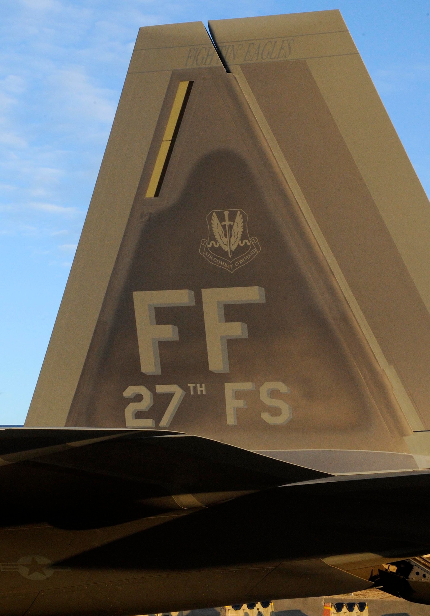 LANGLEY AIR FORCE BASE, Va --Col. Peter Fesler, 27th Fighter Squadron commander, brings home the updated 27th FS flagship Jan. 24. F-22 Raptor was delivered straight from the factory with the squadron emblem painted on the tail. (U.S. Air Force photo/ Staff Sgt. Dana Hill) (Released)