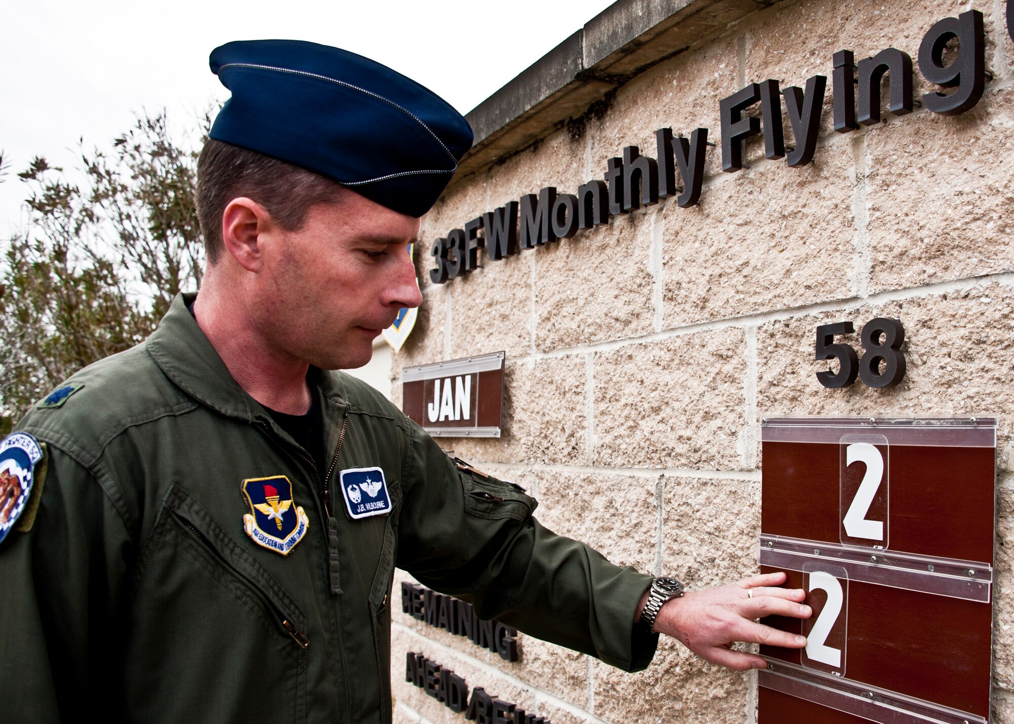 Lt. Col. John Wilbourne, 58th Fighter Squadron, updates the 33rd Fighter Wing sortie board for the first time in a year and a half after flying in one of the first two sorties for the wing using the F-16s from Luke Air Force Base, Ariz.  (U.S. Air Force photo/Samuel King Jr.) 