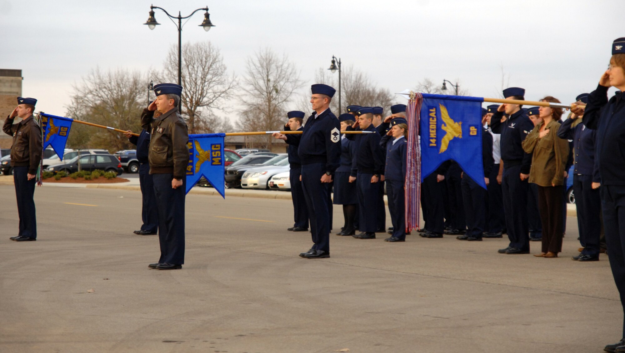 Team BLAZE members render salutes during the Jan. 25 wing retreat ceremony at Smith Plaza. The retreat ceremony marks the end of the duty day. (U.S. Air Force photo/Airman 1st Class Chase Hedrick)
