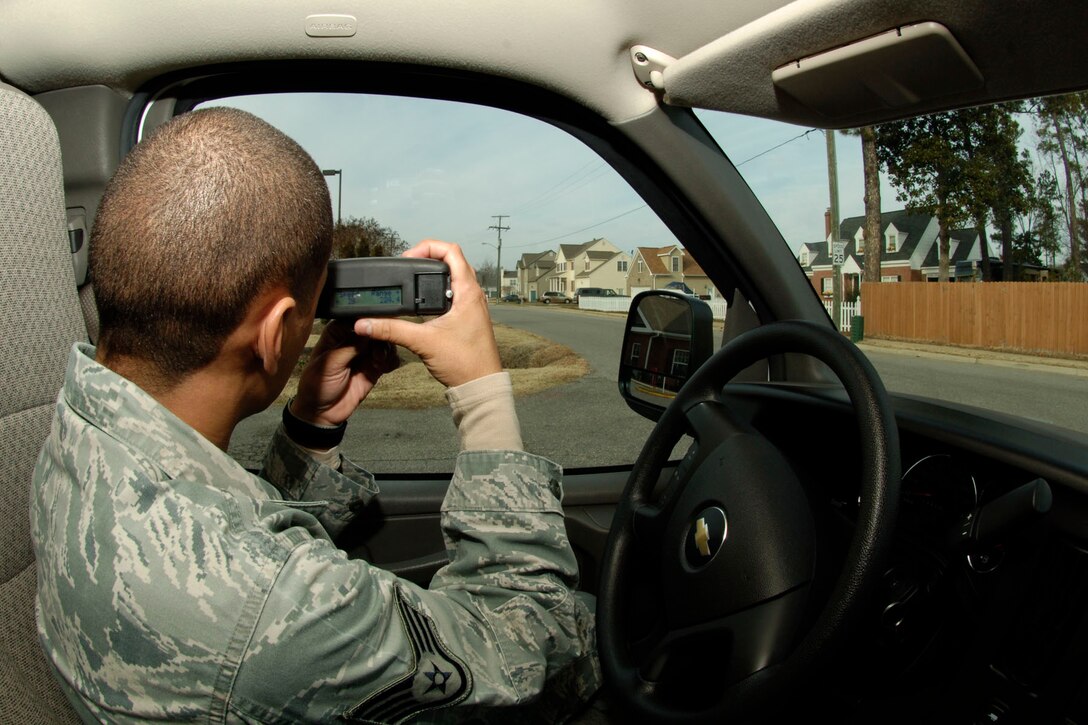 LANGLEY AIR FORCE BASE, Va. – Staff Sgt. Trayshawn Humphries, 633d Security Forces Squadron speed measurement instructor, uses Light Detection and Ranging technology to determine if a driver is abiding by posted speed limits Jan. 25. Security Forces members use radar systems to monitor vehicle speed, visually estimating within five miles of the vehicle’s actual speed. (U.S. Air Force photo/Airman 1st Class Racheal Watson)(RELEASED)