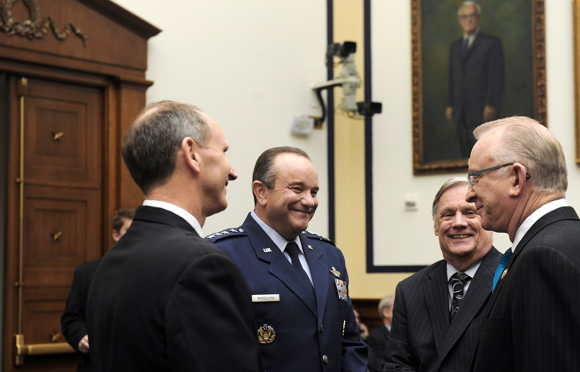 (From left) Vice Chief of Naval Operations Adm. Jonathan Greenert and Air Force Vice Chief of Staff Gen. Philip Breedlove visit with House Armed Services Committee Chairman Howard P. McKeon (far right) on Capitol Hill Jan. 26, 2011 in Washington.  General Breedlove, the vice chiefs from the other services and the deputy secretary of defense discussed Department of Defense efficiencies with committee members during a hearing.  (U.S. Air Force photo/Scott M. Ash)