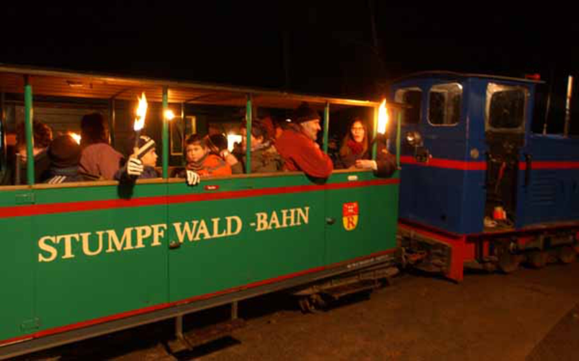 Passengers enjoy torch rides with the Stumpfwaldbahn during the  
"Eiswoog in Flammen" Saturday near Ramsen. (Courtesy Photo)
