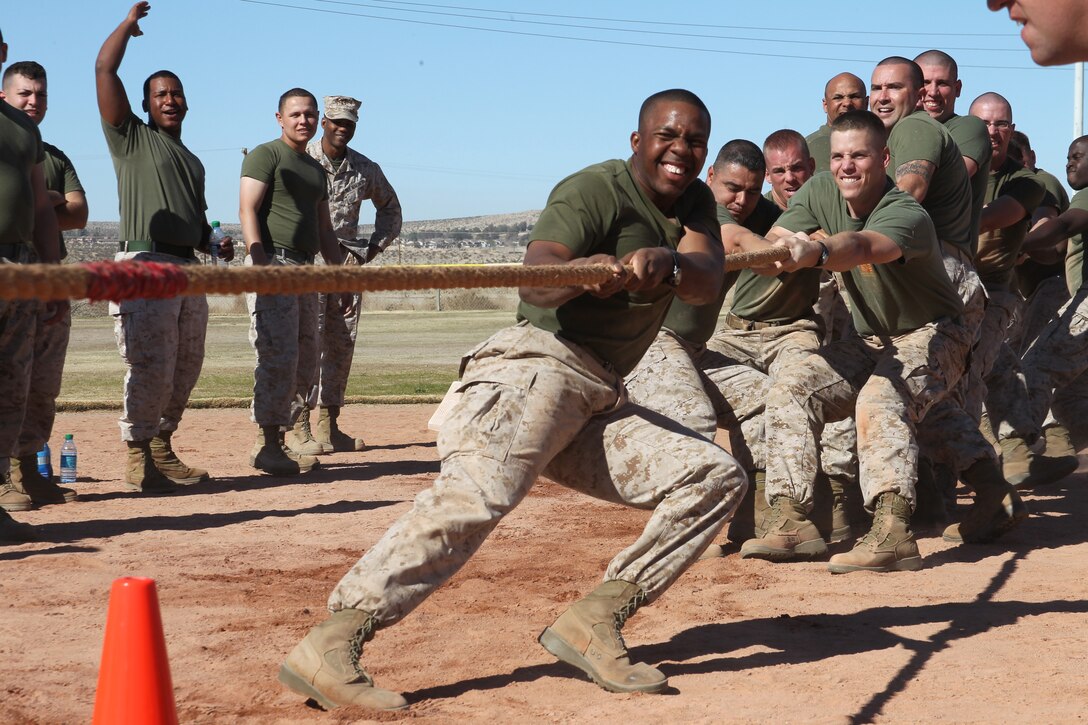 Marines from Headquarters and Services Company of 3rd Light Armored Reconnaissance Battalion compete in the tug-of-war event during the 3rd LAR’s field meet at Del Valle Field Jan 28, 2011.