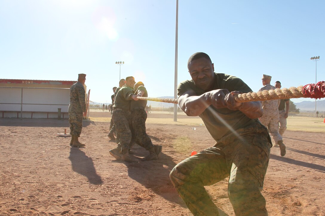 Marines from Company B of 3rd Light Armored Reconnaissance Battalion putting in their best effort in the tug-of-war event during the 3rd LAR’s field meet at Del Valle Field Jan 28, 2011.