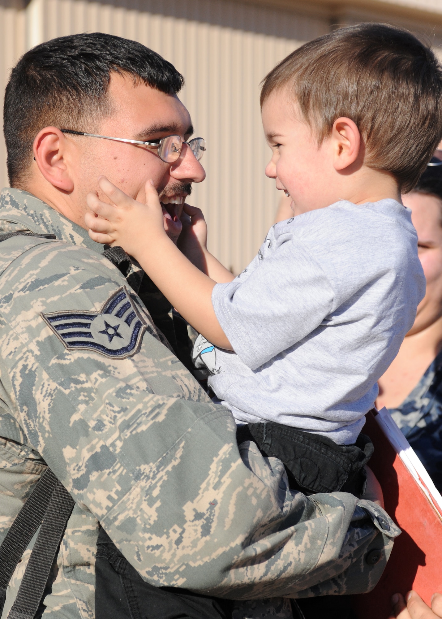DYESS AIR FORCE BASE, Texas – Staff Sgt. Jeremy Lala, 7th Aircraft Maintenance Squadron, plays with his son Alexander Jan. 27 here upon arrival from a deployment. Sergeant Lala was deployed to Southwest Asia in support of Operations New Dawn and Enduring Freedom. (U.S. Air Force photo/ Senior Airman Jenifer H. Calhoun)