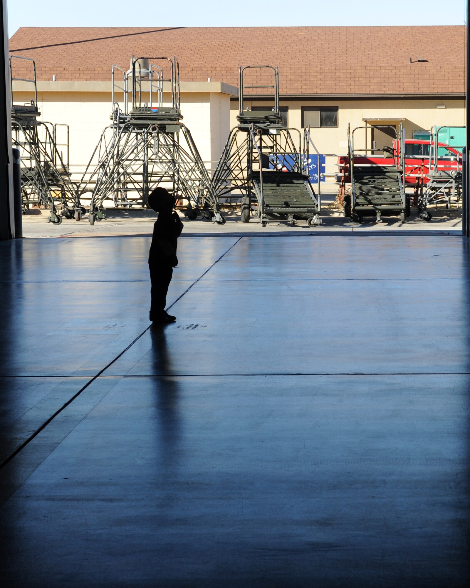DYESS AIR FORCE BASE, Texas – Jonas Stallworth, son of Brandie and Capt. Ryan Stallworth, 9th Bomb Squadron, plays Jan. 27 in hangar 225 here while waiting for his father’s arrival from a deployment. Airmen from the 7th Bomb Wing were deployed to Southwest Asia in support of Operations New Dawn and Enduring Freedom. (U.S. Air Force photo/ Senior Airman Jenifer H. Calhoun)