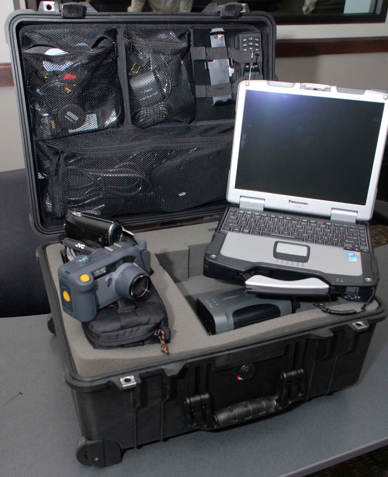 Five Geospatial Information Interoperability Exploitation Portable go kits, like the one shown here, were presented by Air Forces Northern officials to Civil Air Patrol members Jan. 26, 2011, at Maxwell Air Force Base, Ala. The GIIEPs feature self-contained communications equipment and other hardware that allows for real-time and near-real-time full-motion video, digital imagery and in-flight chat capability with federal, state and local emergency operations centers supporting emergency situations. (Civil Air Patrol photo/Steve Cox)