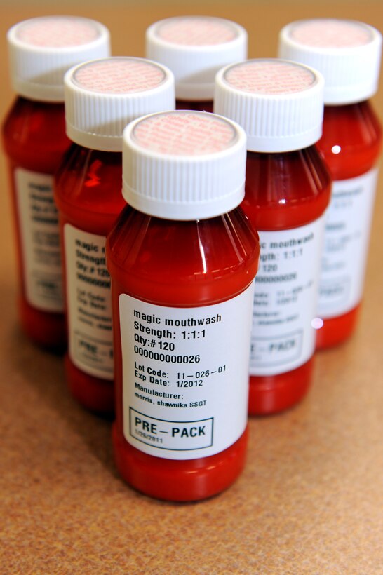Nine bottles of “magic mouthwash,” manufactured by Staff Sgt. Shanika Morris, 28th Medical Support Squadron pharmacy frontline supervisor, sit sealed and labeled at Ellsworth Air Force Base, S.D., Jan. 26, 2011.  “Magic mouthwash” is a mixture of lidocaine viscous, liquid antihistamine and liquid antacid, used to treat mouth sores and stomach ulcers. (U.S. Air Force photo/Staff Sgt. Marc I. Lane)