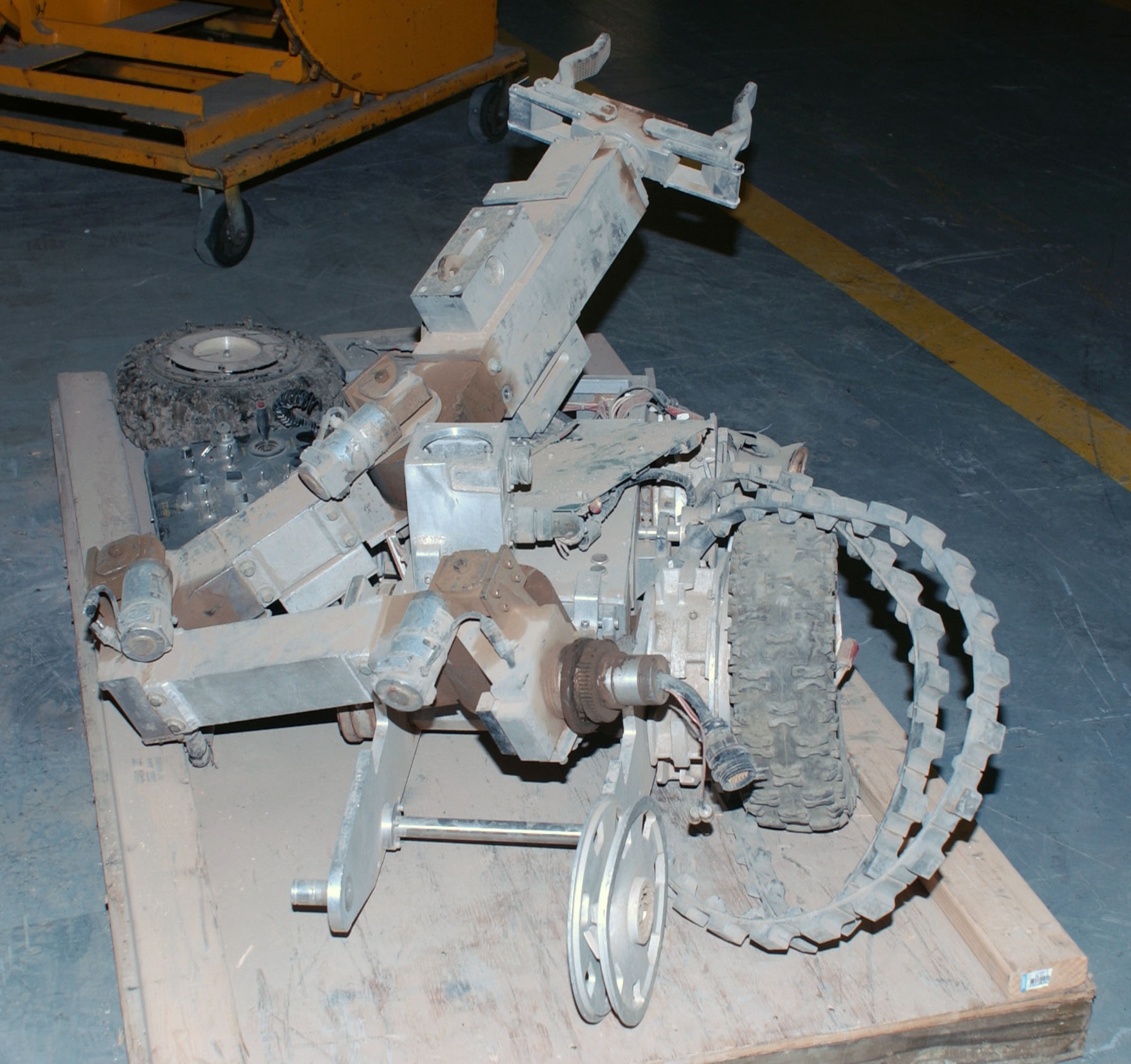 This robot, controlled by an Air Force Explosive Ordnance Disposal (EOD) team, was destroyed by an improvised explosive device during Operation Iraqi Freedom. (U.S. Air Force photo)