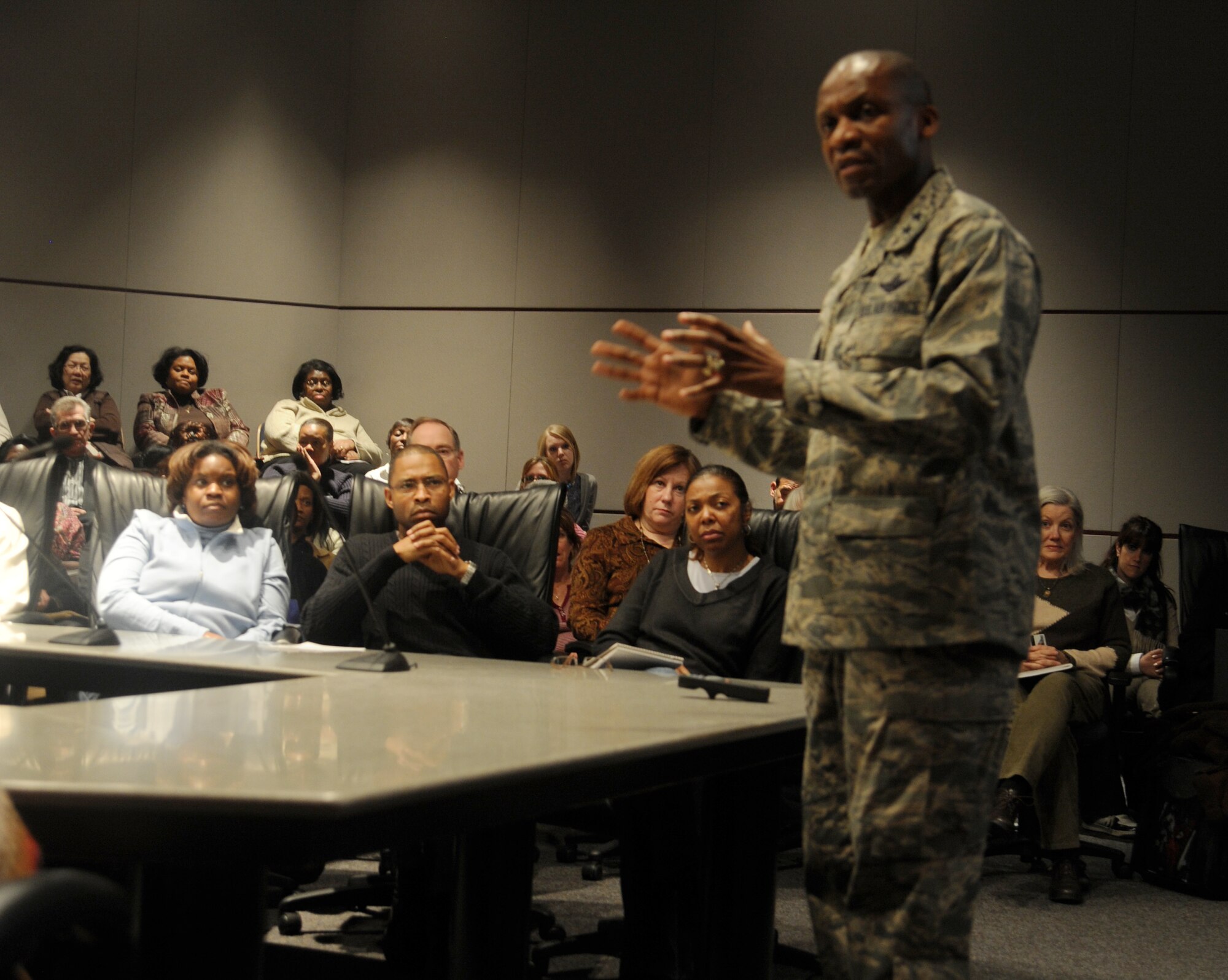 Air Force District of Washington Commander Maj. Gen. Darren W. McDew explains his Air Force upbringing, education and expectations for the unit at a civilian call held Jan. 28 at the Air Force Conference Center, Andrews AFB, Md.  The conference center was filled to standing room only. (USAF Photo by Benjamin Newell)
