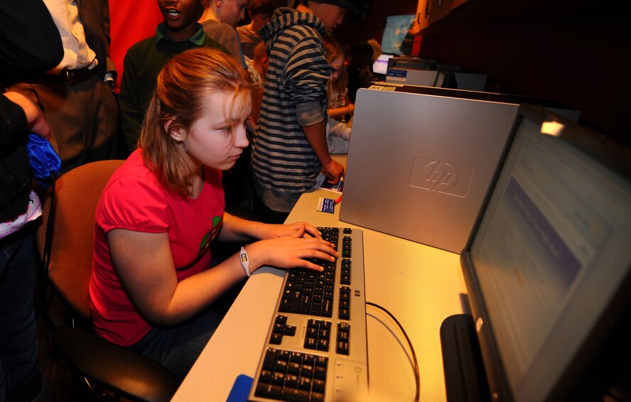 OFFUTT AIR FORCE BASE, Neb. - Twelve-year-old Mariah Kilpatrick, daughter of Dan Kilpatrick, gets a first look at Tutor.com Jan. 26 during an introductory session held at Offutt's youth center. Children were given a brief orientation of the website along with hands on learning session complete with a gift card raffle.U.S. Air Force Photo by Josh Plueger (Released)
