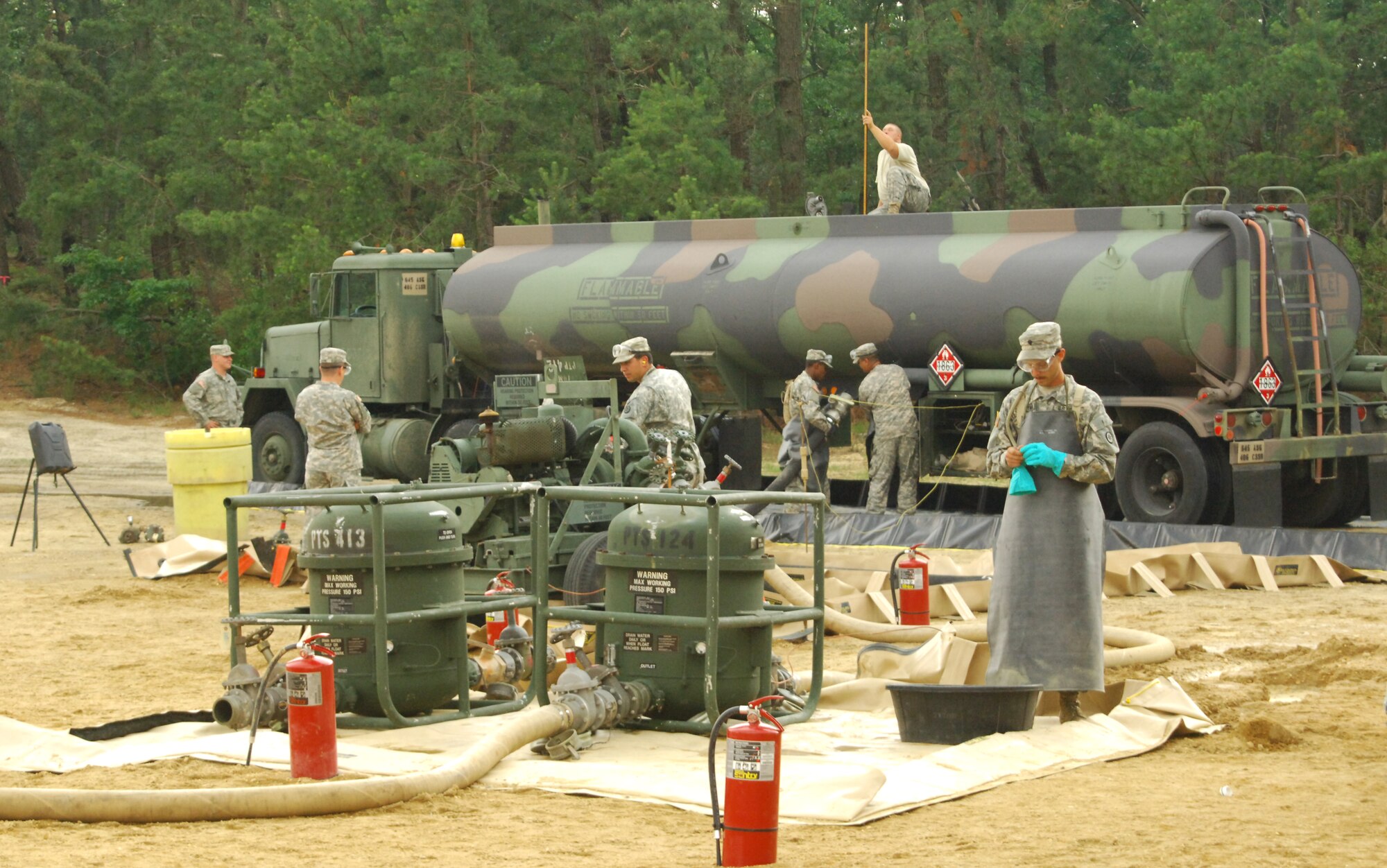 Soldiers from the 277th Quartermaster Company prepare to unload diesel fuel in a tactical training environment during last year’s annual training at Joint Base McGuire-Dix-Lakehurst. The Quartermaster Liquid Logistics Exercise will return to ASA-Dix training areas this year and involve approximately 1,000 Army Reserve Soldiers. (Courtesy photo)