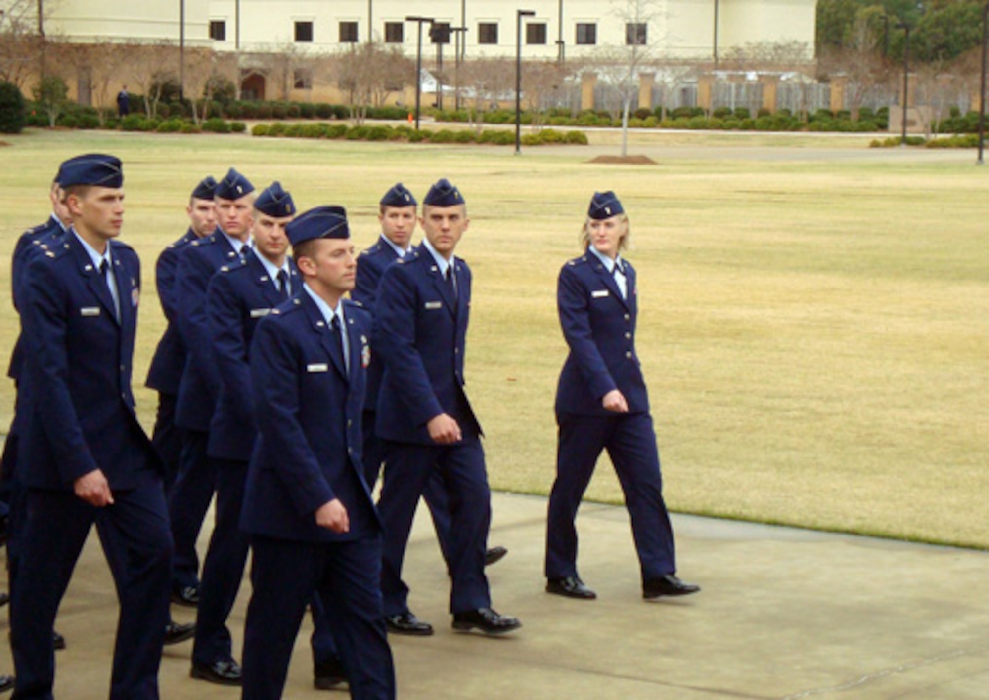 (Far right) Second Lieutenant Melanie Singer marches in the ceremonial parade during her graduation from Officer Training School at Maxwell Air Force Base, Ala., on Dec. 16. (U.S. Air Force photo/Chief Master Sgt. David Macerelli)