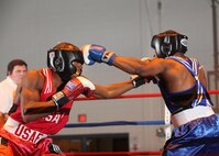 Air Force welterweights Daniel Logan, left, and James Beck, right, compete during the Air Force Box-off tournament at the Bennett Fitness Center Jan. 22. (U.S. Air Force photo/Robbin Cresswell)