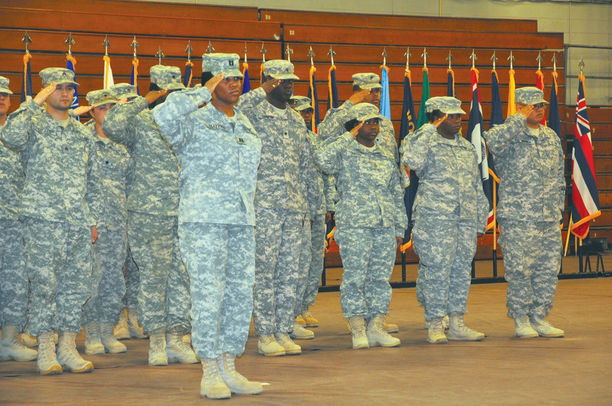 Captain Mina Mayer, (front, center) commander of troops, stands before the Soldiers assigned to the 510th Human Resource Company, Special Troops Battalion, 7th Sustainment Brigade. A welcome home ceremony took place at Fort Eustis’ Anderson Field House Tuesday night. The group of 30 Soldiers returned home upon completion of a 12-month deployment to Kuwait in support of Operation New Dawn and Operation Enduring Freedom. (Photo by Sgt. 1st Class Kelly Jo Bridgwater)


