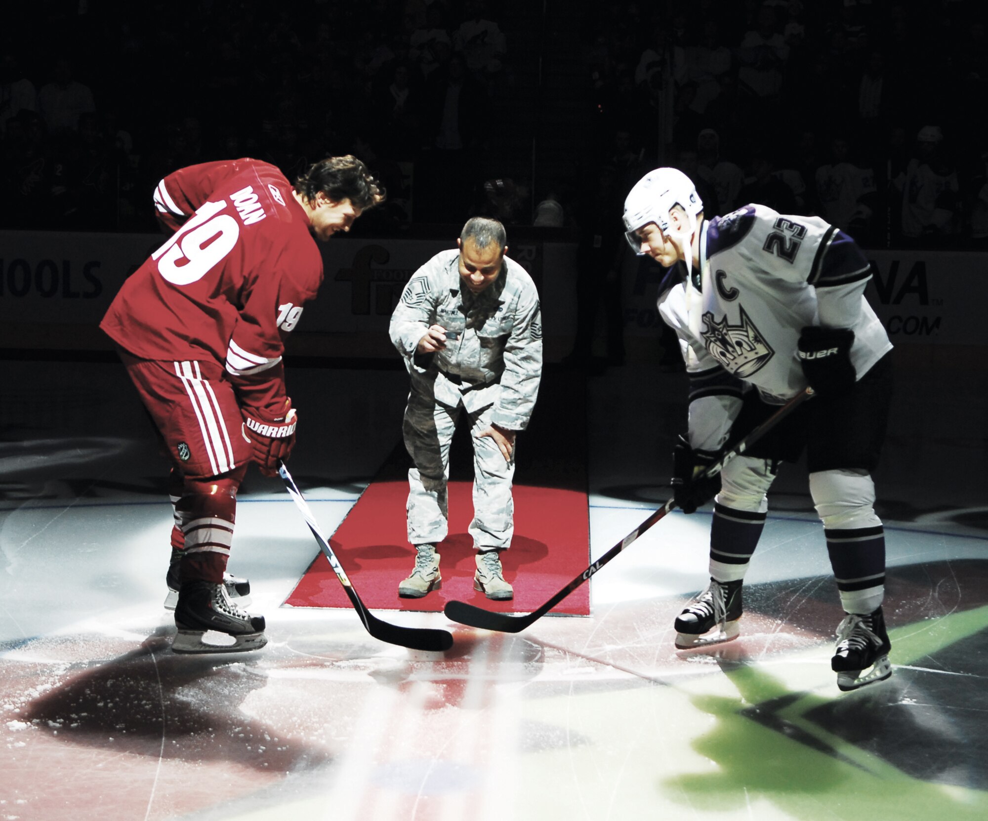 The Phoenix Coyotes honored our nation's service men and women during their Annual Armed Forces Appreciation Night on Jan. 22nd at Jobing.com Arena.  Chief Master Sgt. Anthony Martinez, 56th Operations Group superintendent, represented Luke's Airmen by dropping the puck to begin the game.  (U.S. Air Force photo/Airman David Owsianka)