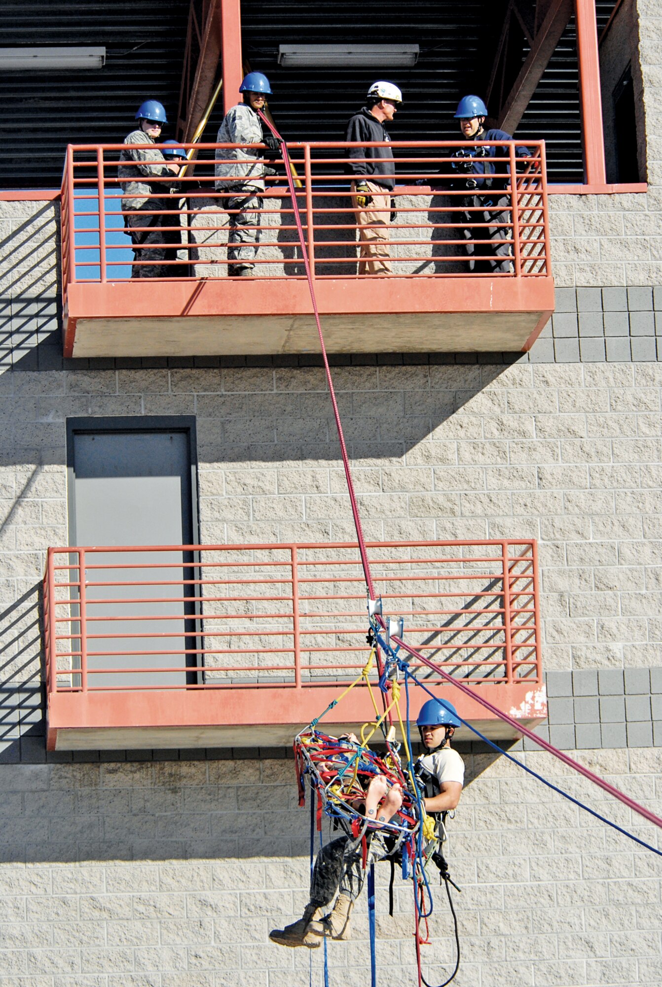 Participants of the Rescue Technician 1 Course perform a high-line operation rescue Jan. 20th held at the Glendale Regional Public Safety Training Center.  (U.S. Air Force photo/Airman 1st Class Sandra Welch)