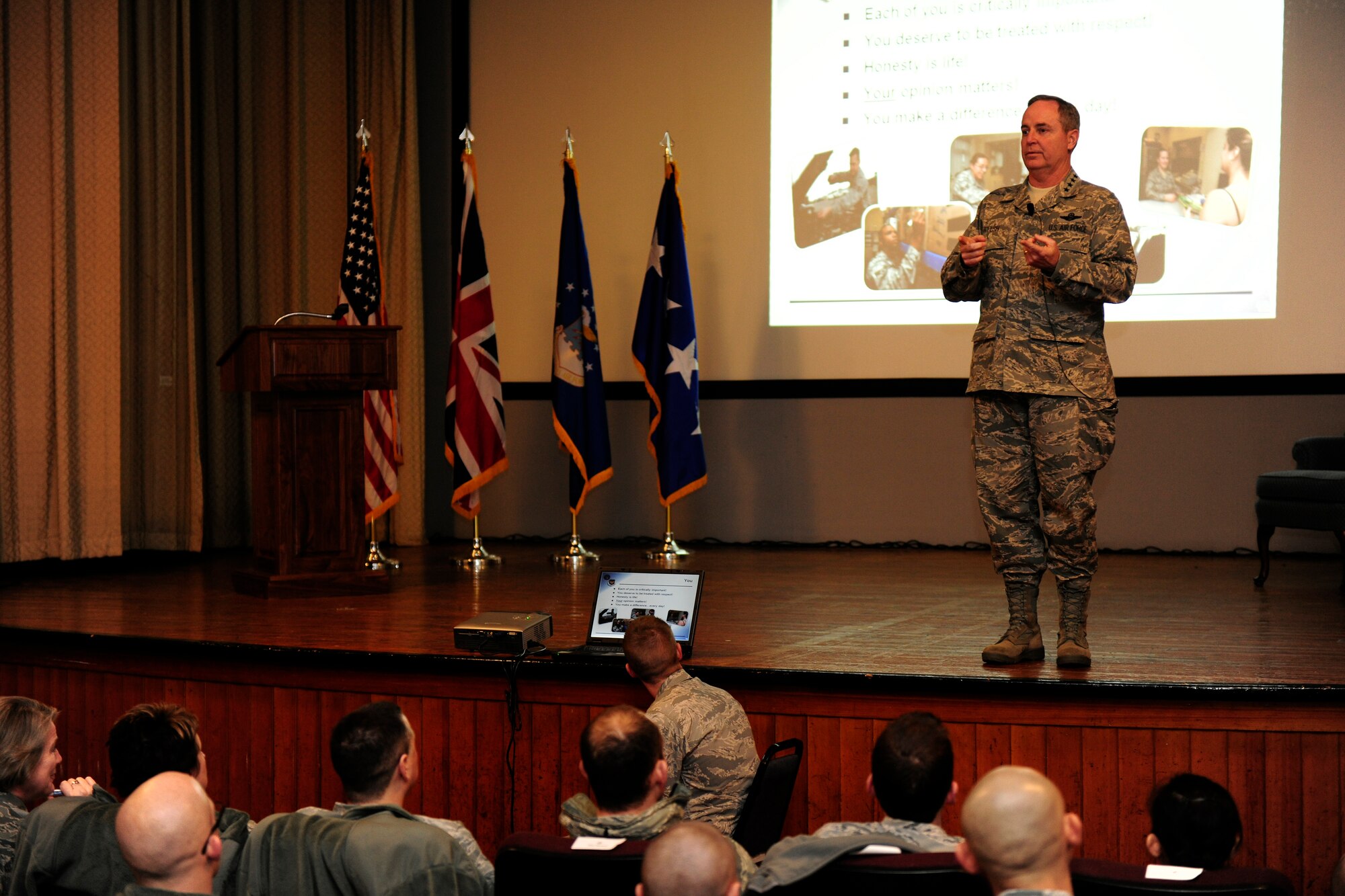 United States Air Forces in Europe Commander, Gen. Mark Welsh, briefs Airmen at a commander’s call at the RAF Alconbury base theater, Jan. 25, 2011. The general visited 501st Combat Support Wing bases in the United Kingdom as part of his orientation visit with the USAFE Command Chief, Chief Master Sgt. David Williamson. (U.S. Air Force photo by Tech. Sgt. John Barton)