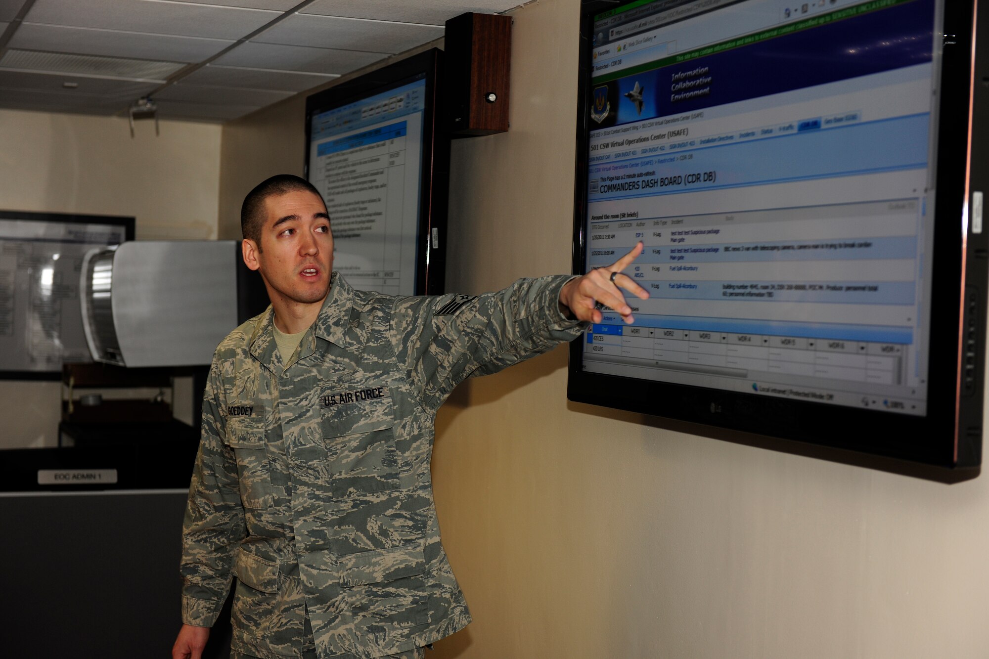 Staff Sgt. James Goeddey explains how the 501st Combat Support Wing’s Virtual Operations Center works during the orientation visit of Gen. Mark Welsh, commander, United States Air Forces in Europe, and Chief Master Sgt. David Williamson, USAFE command chief, Jan. 25, 2011. Sergeant Goeddey, 501st Combat Support Wing Readiness and Emergency Management Flight, was instrumental in establishing the wing’s first-ever VOC. (U.S. Air Force photo by Tech. Sgt. John Barton)