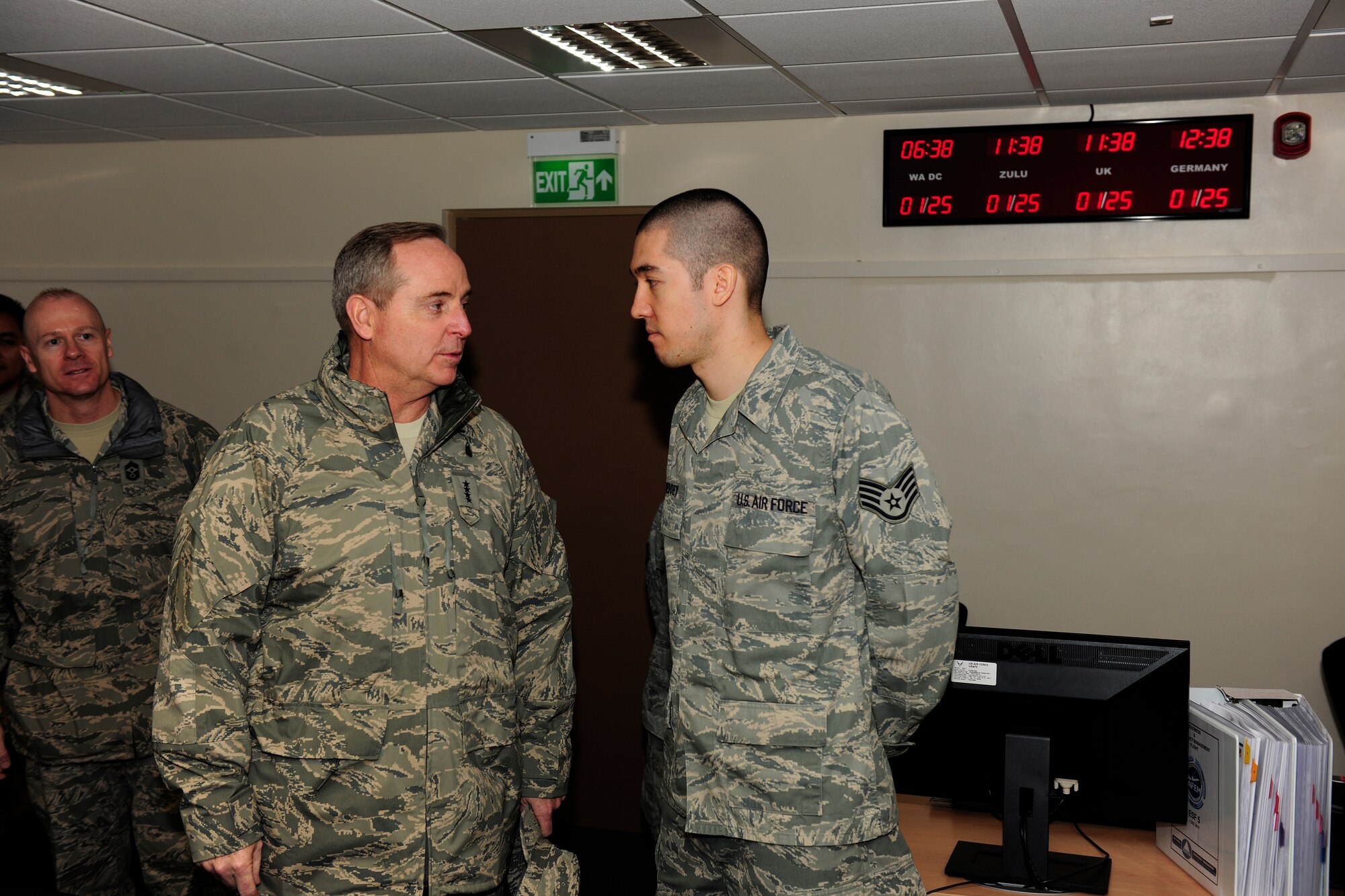 Staff Sgt. James Goeddey answers questions from Gen. Mark Welsh about the 501st Combat Support Wing’s Virtual Operations Center Jan. 25, 2011. The general visited wing bases in the United Kingdom as part of his orientation visit as commander, United States Air Forces in Europe. (U.S. Air Force photo by Tech. Sgt. John Barton)